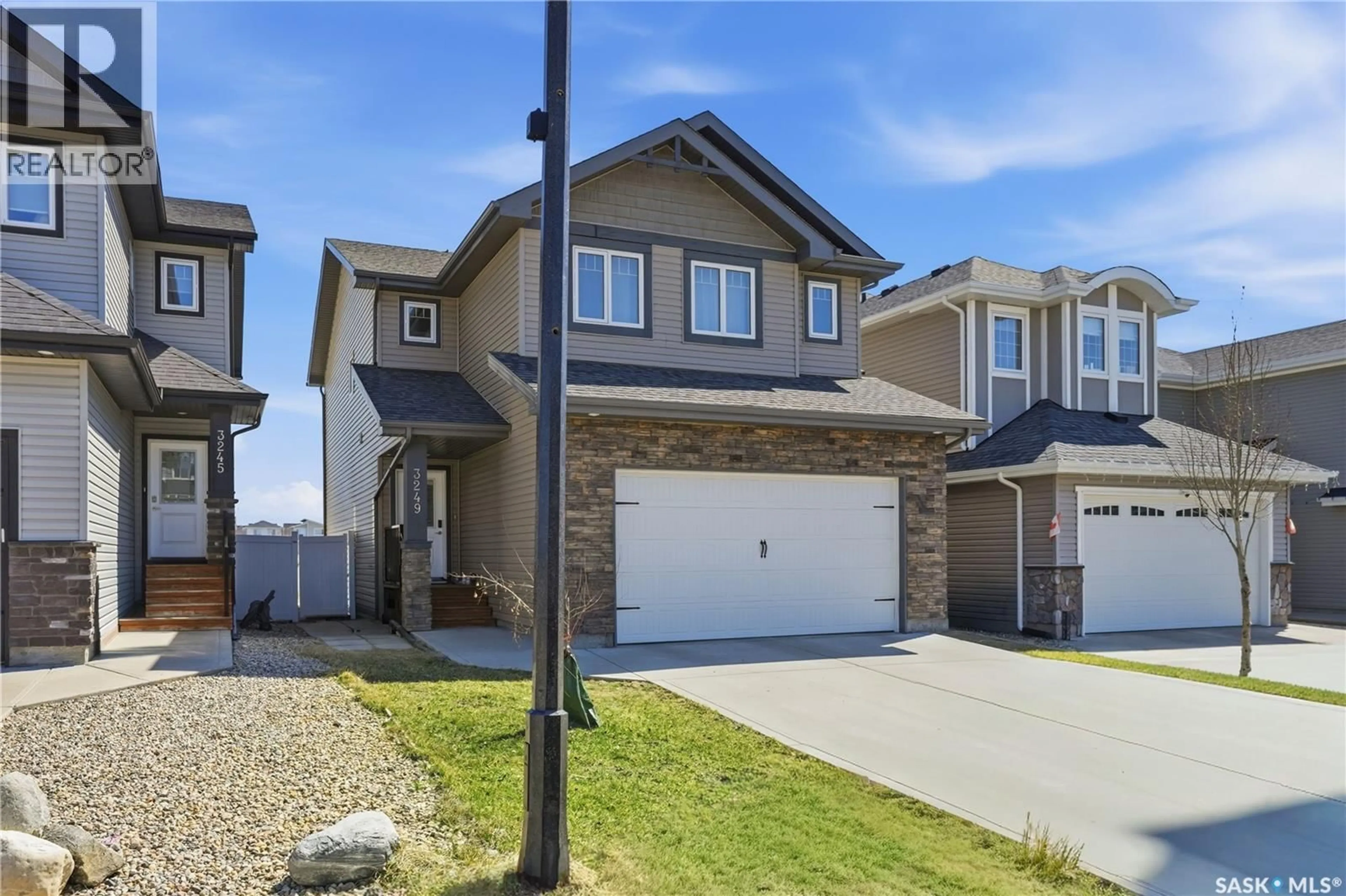 Home with brick exterior material, street for 3249 GREEN WATER DRIVE, Regina Saskatchewan S4V3R6