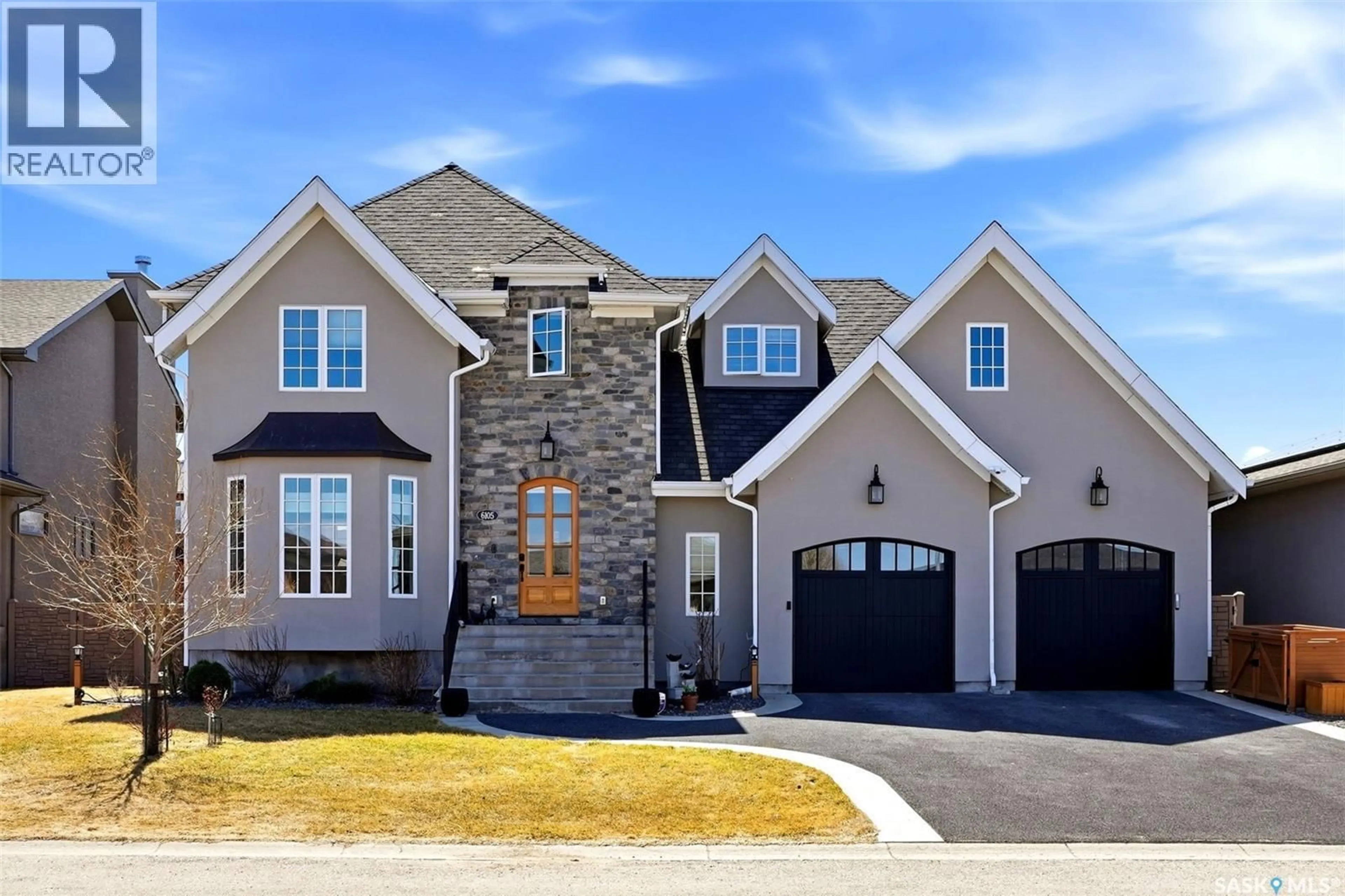 Home with brick exterior material, street for 6105 LITTLE PINE LOOP, Regina Saskatchewan S4X0J2