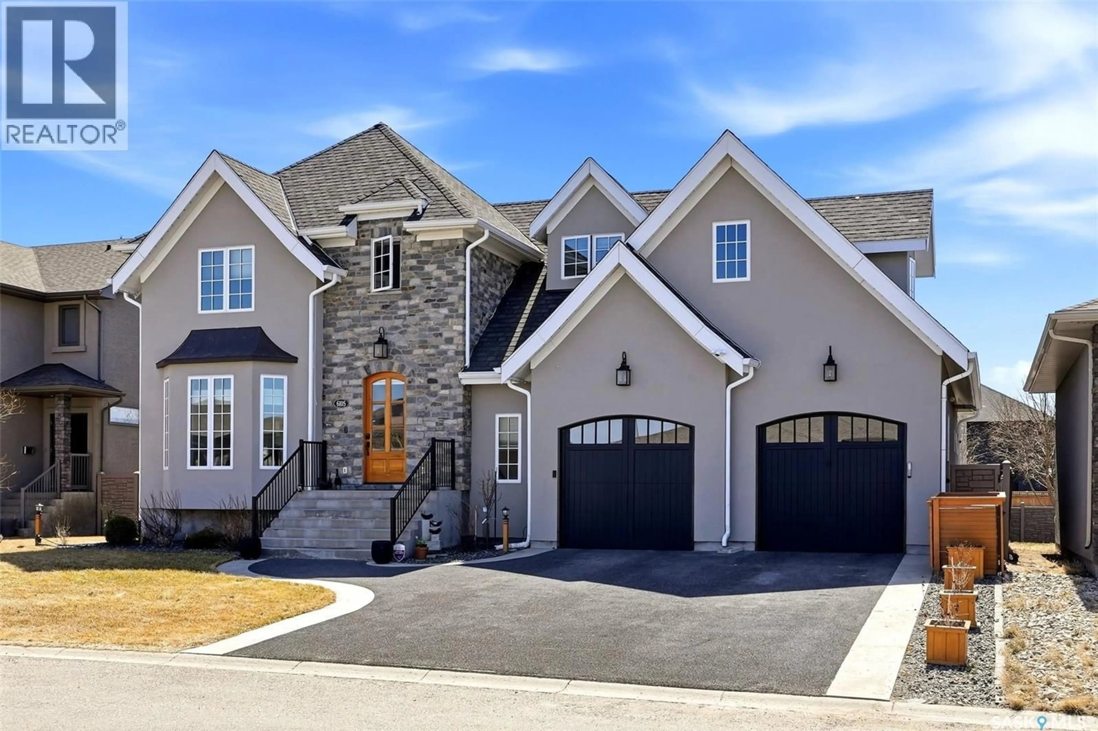 Home with brick exterior material, street for 6105 LITTLE PINE LOOP, Regina Saskatchewan S4X0J2