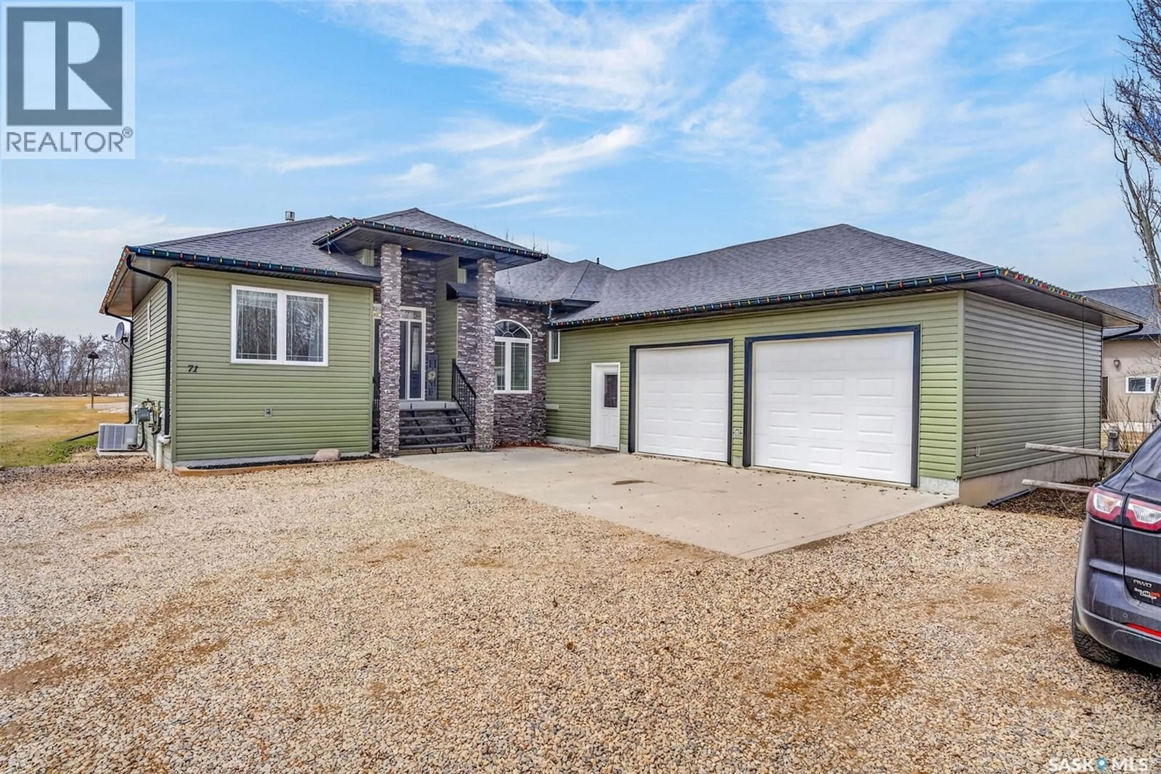 Home with vinyl exterior material, street for 71 14TH STREET, Humboldt Saskatchewan S0K2A0