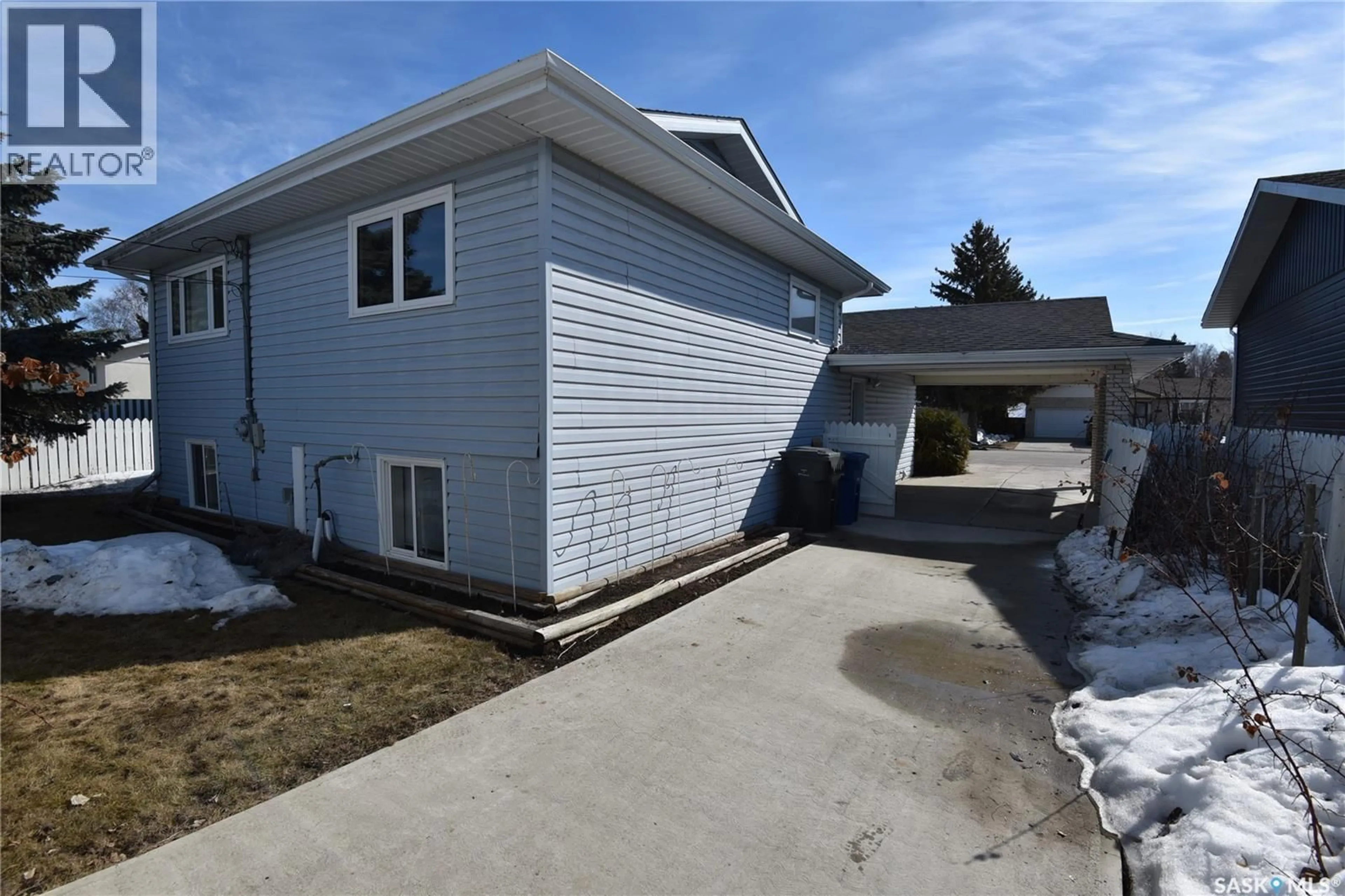 Home with vinyl exterior material, street for 1300 CENTRE STREET, Nipawin Saskatchewan S0E1E0