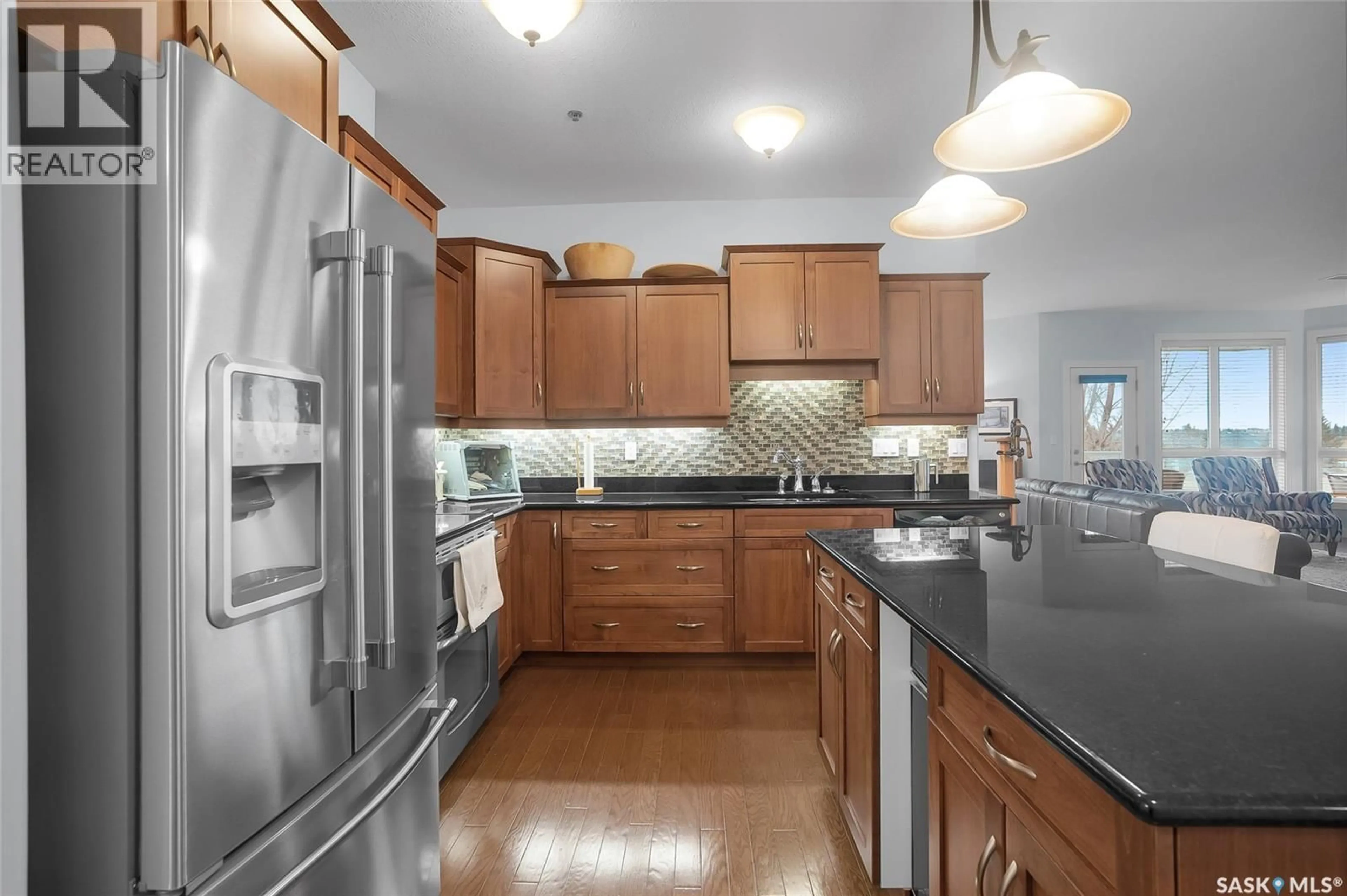 Open concept kitchen, unknown for 204 - 401 CARTWRIGHT STREET, Saskatoon Saskatchewan S7T0B3