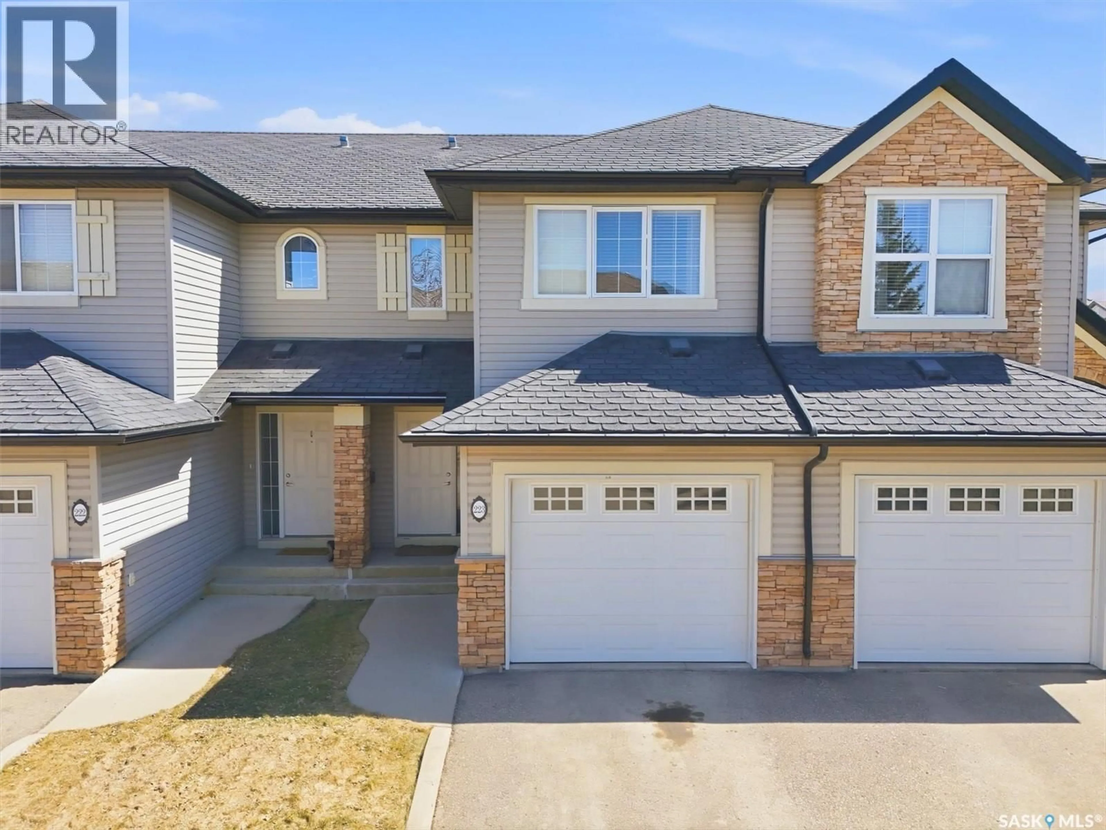 Home with brick exterior material, street for 105 LYND CRESCENT, Saskatoon Saskatchewan S7T0C3