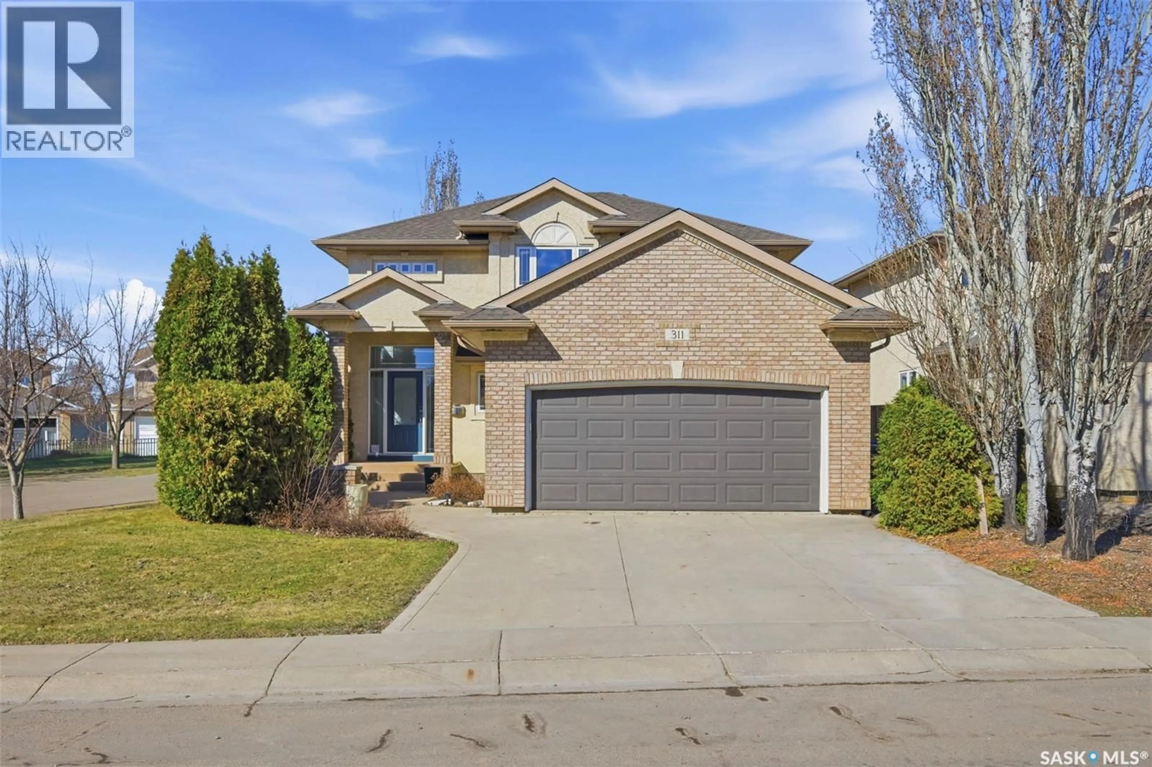Home with brick exterior material, street for 311 GUENTER CRESCENT, Saskatoon Saskatchewan S7N4P6