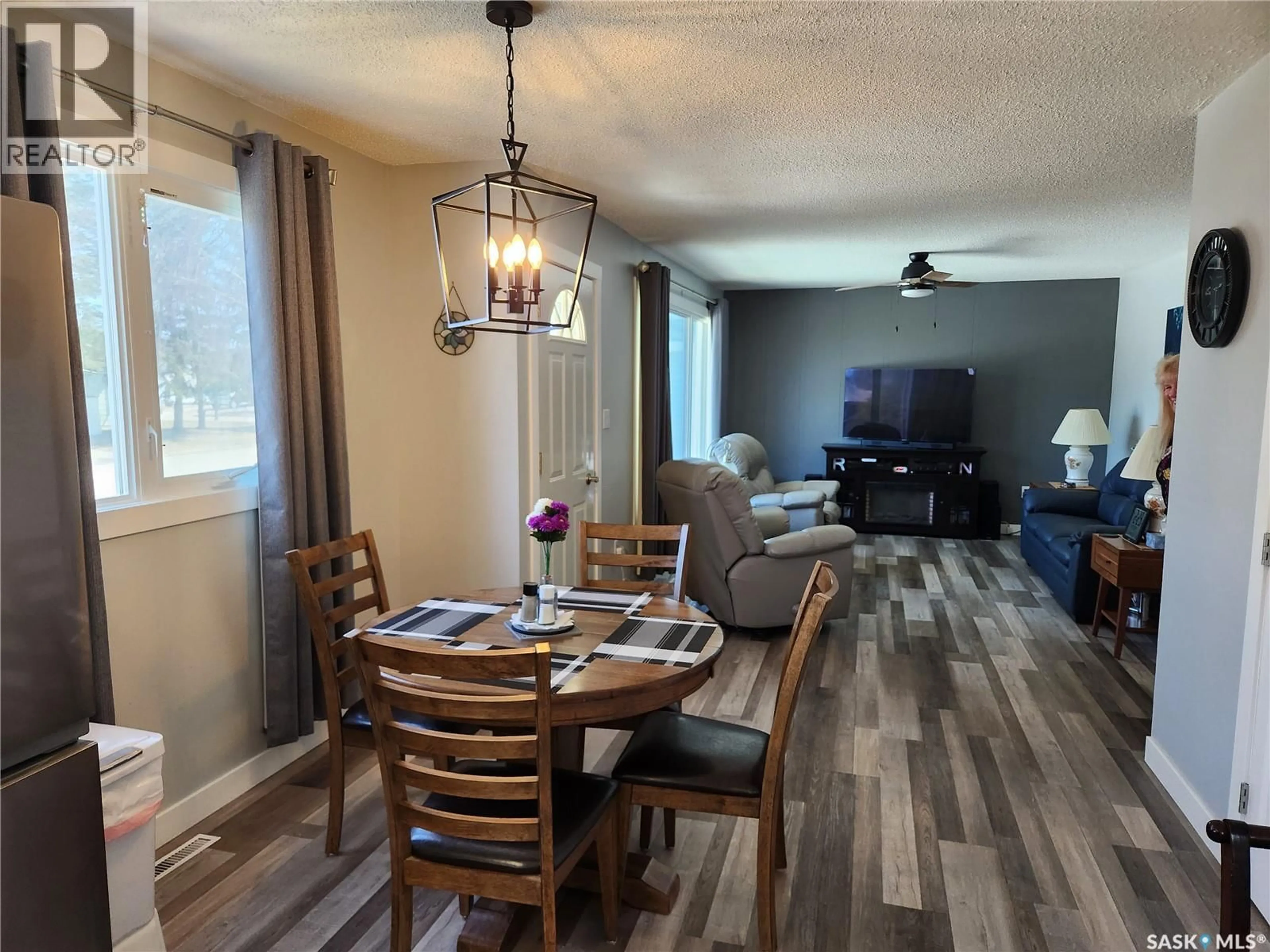 Dining room, wood/laminate floor for 1305 95TH STREET, Tisdale Saskatchewan S0E1T0
