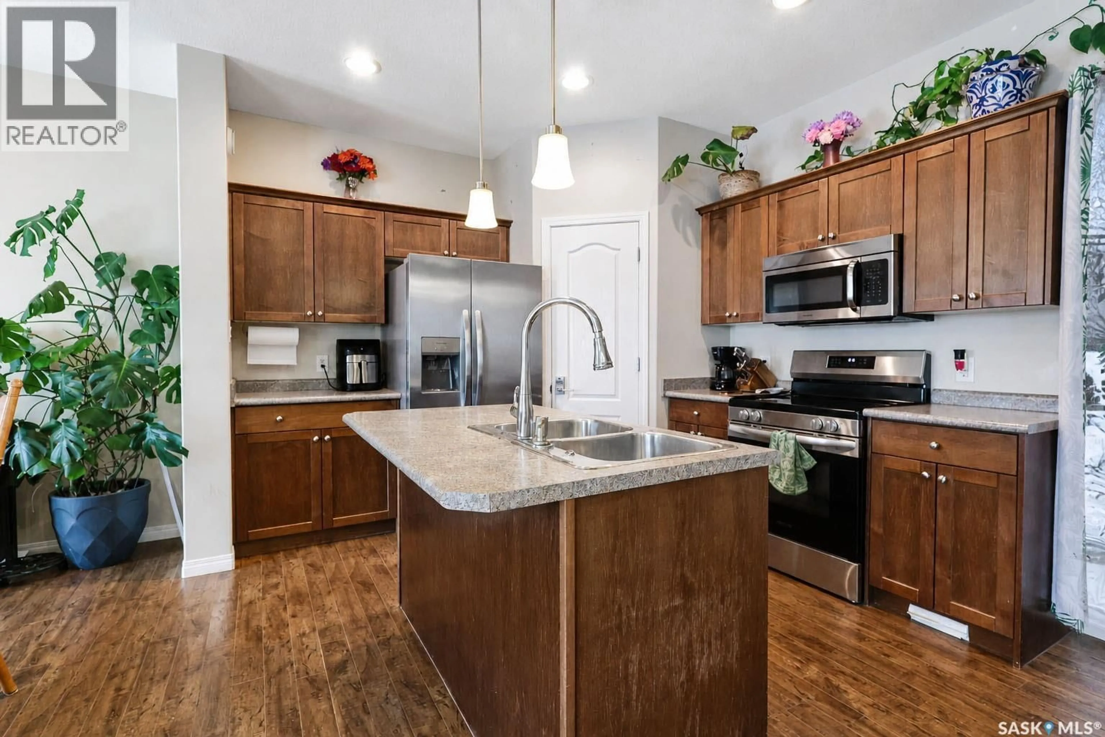 Open concept kitchen, unknown for 28 JACK MATHESON CRESCENT, Prince Albert Saskatchewan S6V8E6