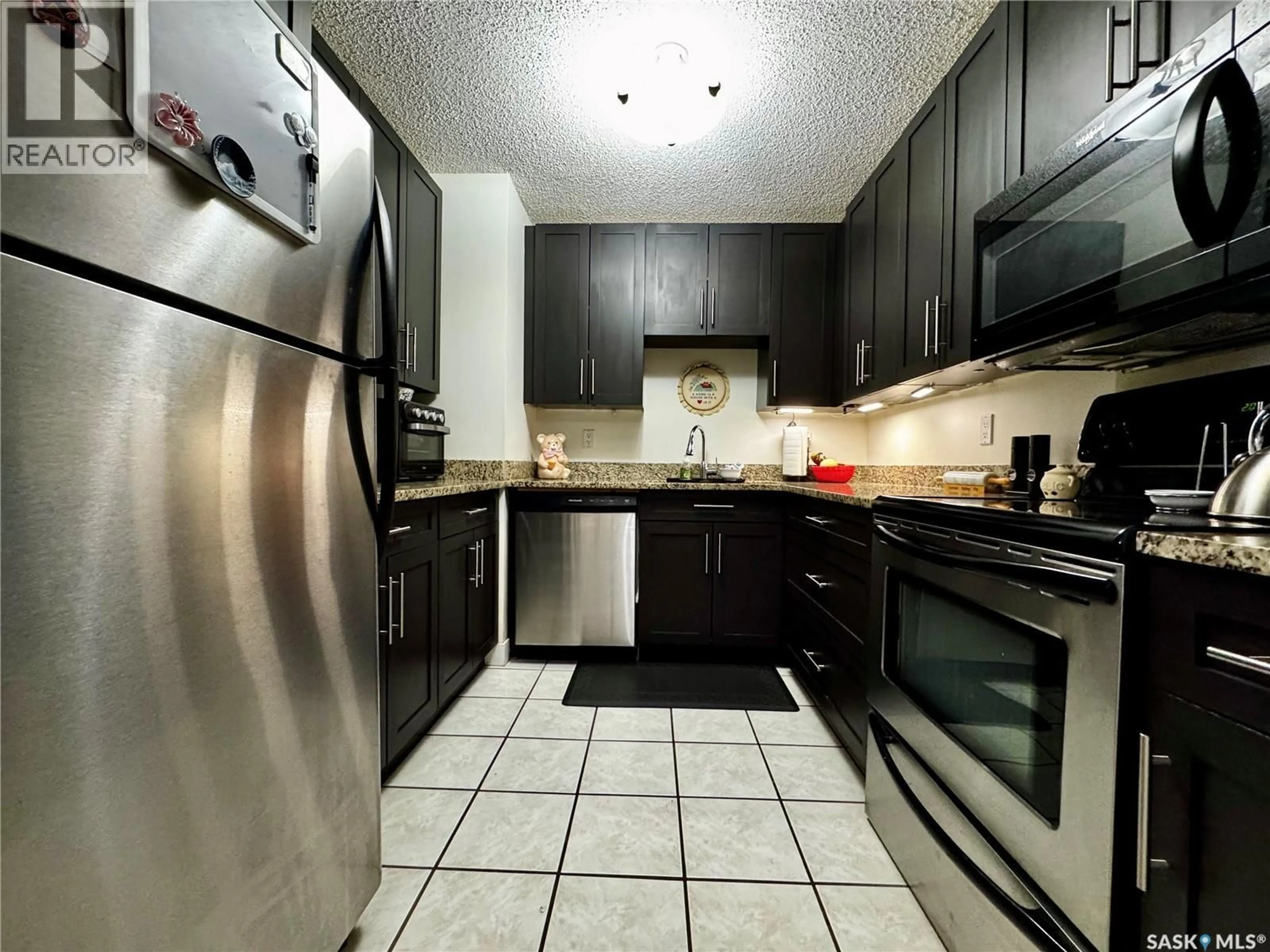 Standard kitchen, ceramic/tile floor for 14 2410 LOUISE STREET, Saskatoon Saskatchewan S7J3L8