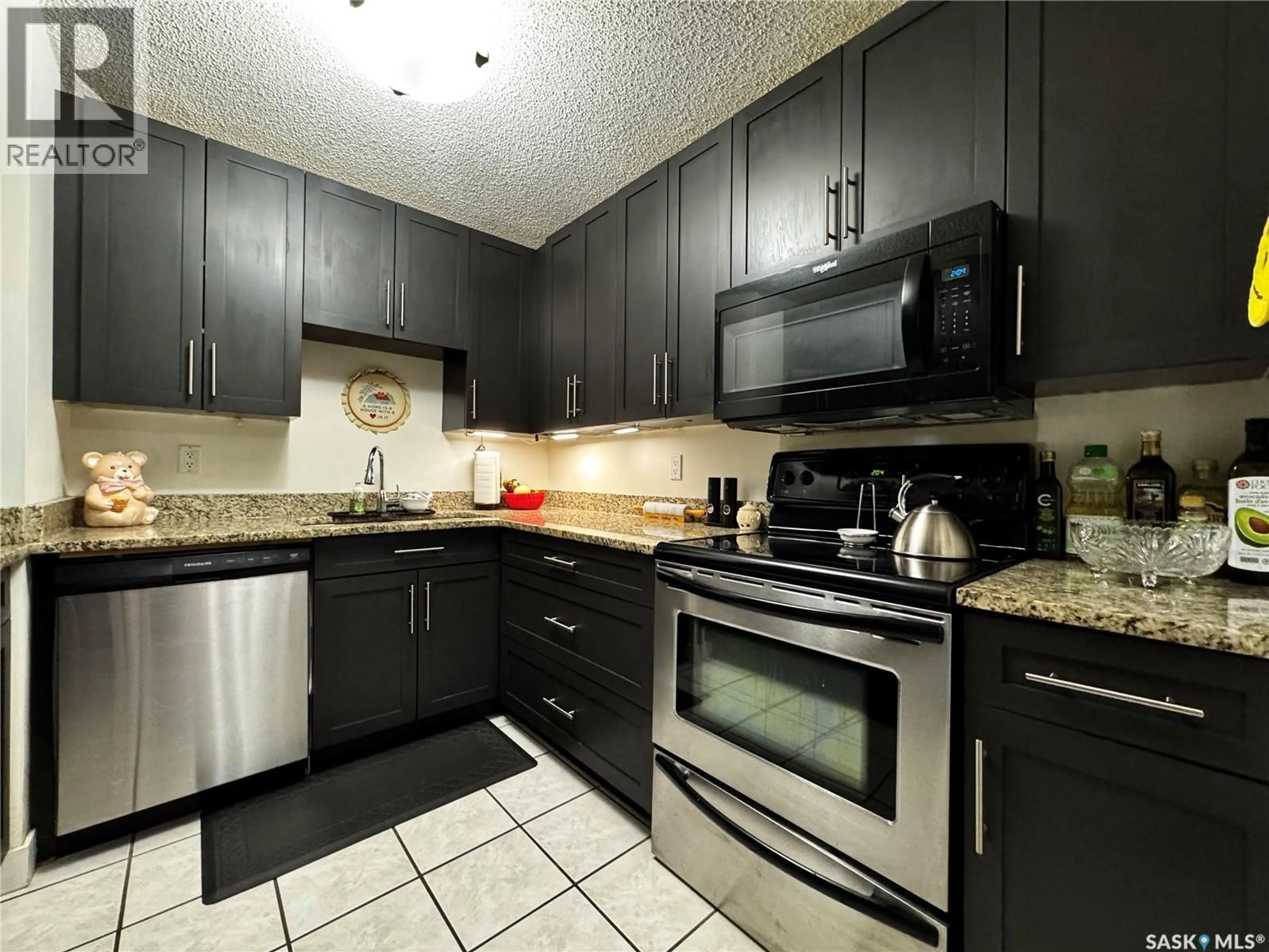 Standard kitchen, ceramic/tile floor for 14 2410 LOUISE STREET, Saskatoon Saskatchewan S7J3L8
