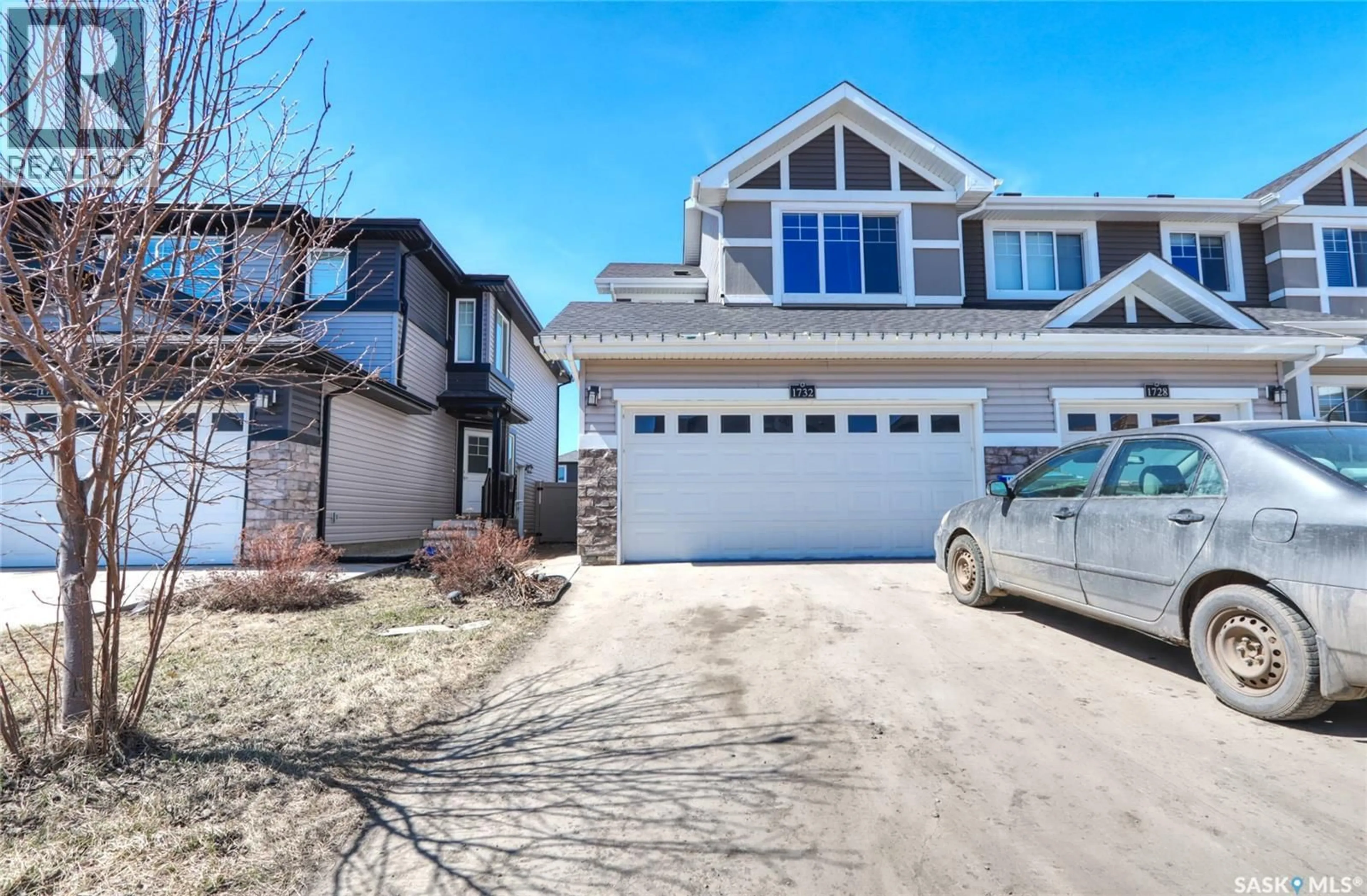 Home with vinyl exterior material, street for 1732 MUSTARD STREET, Regina Saskatchewan S4Y0G1