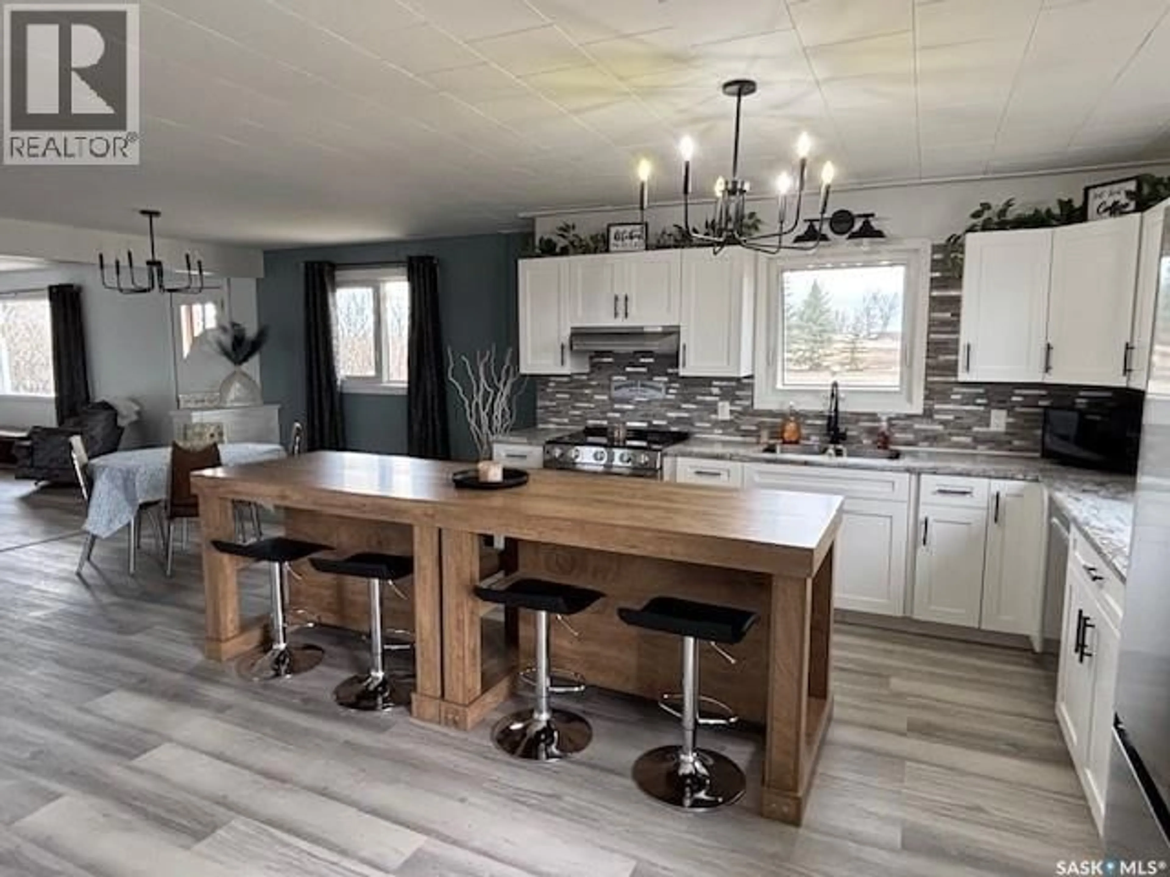 Open concept kitchen, wood/laminate floor for PAWLIW ACREAGE, Preeceville Rm No. 334 Saskatchewan S0A3B0
