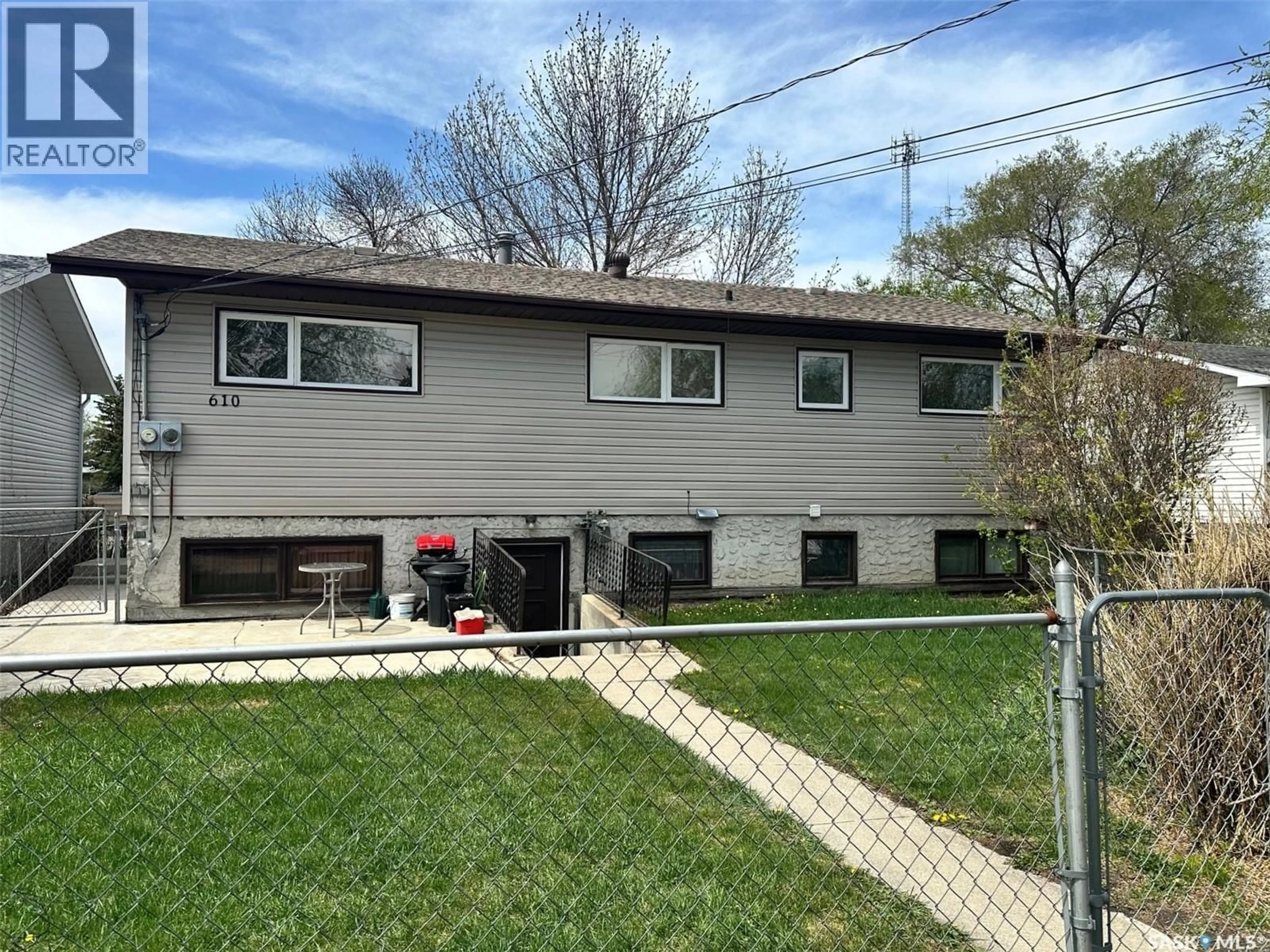 Home with vinyl exterior material, street for 610 HUDSON STREET, Hudson Bay Saskatchewan S0E0Y0
