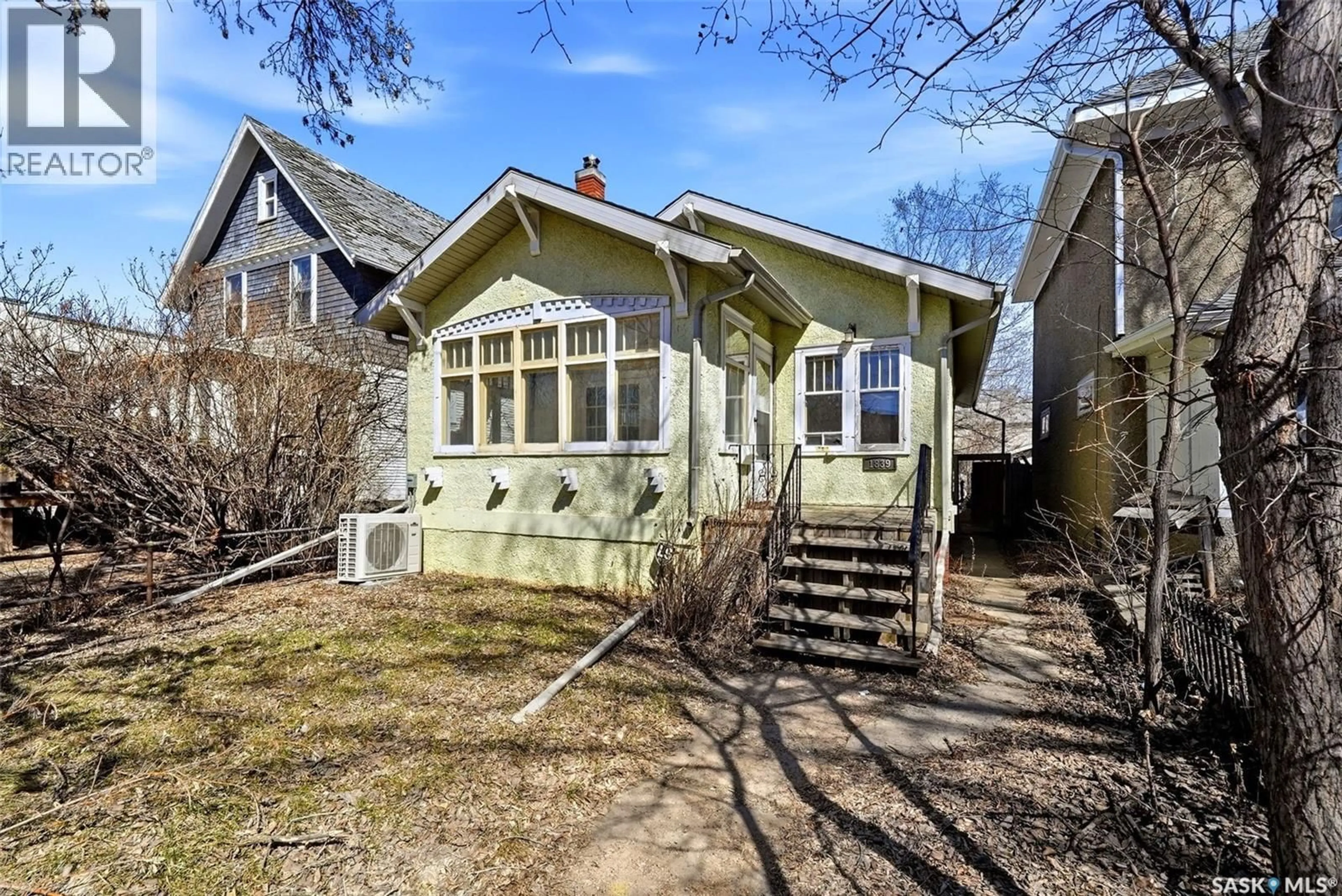 Home with vinyl exterior material, street for 1839 RETALLACK STREET, Regina Saskatchewan S4T2J8