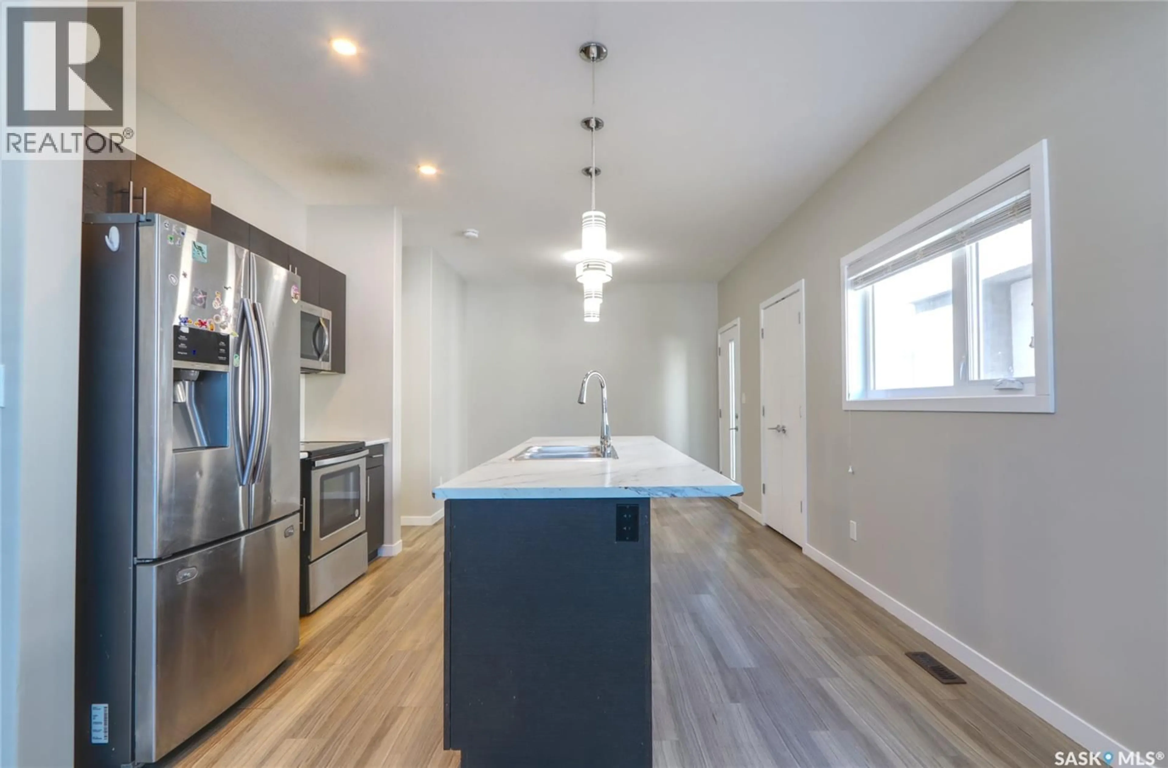 Open concept kitchen, unknown for 3935 JAMES HILL ROAD, Regina Saskatchewan S0G4G0