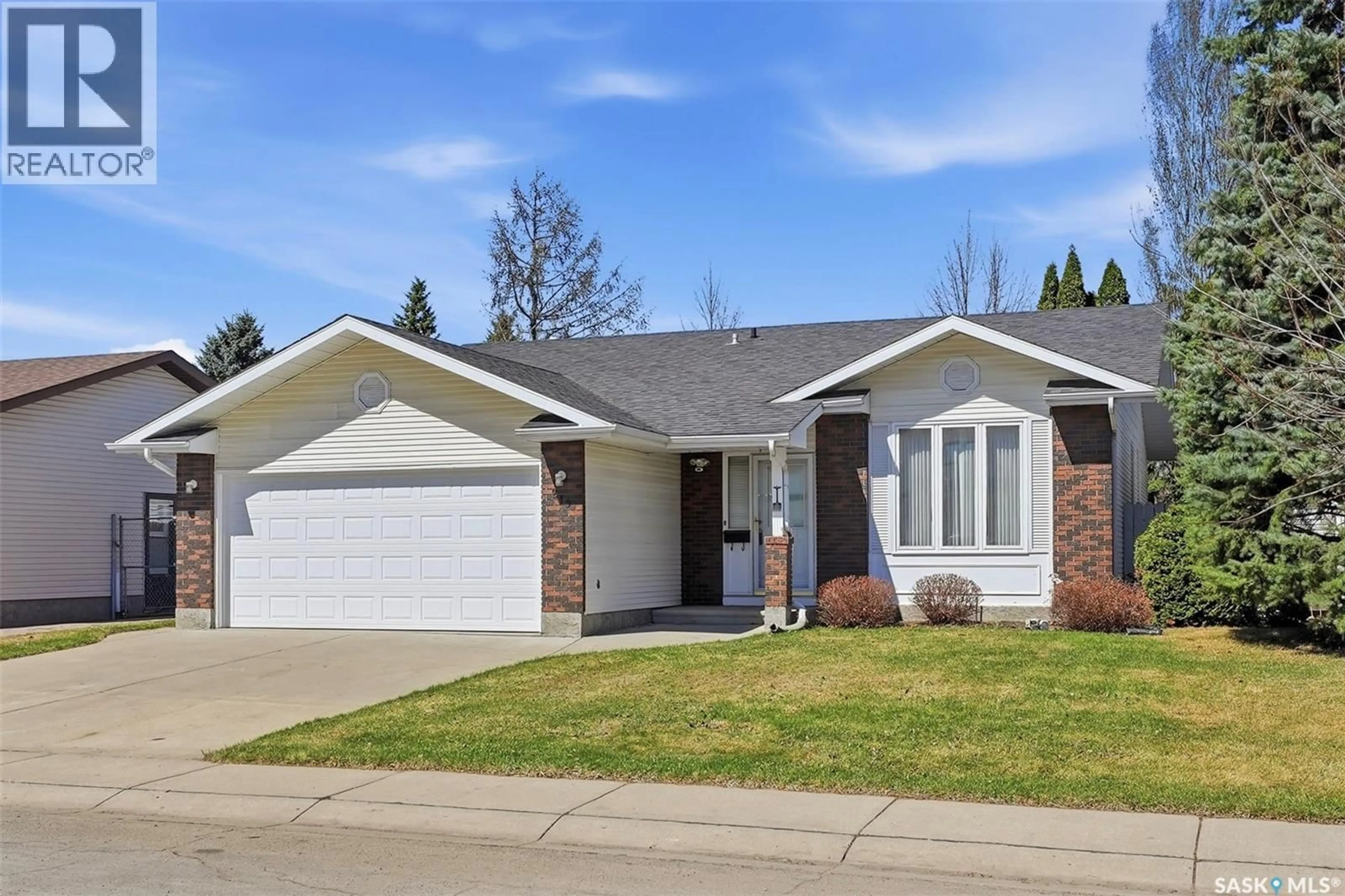 Home with vinyl exterior material, street for 219 BRONSON WAY, Saskatoon Saskatchewan S7J5C9