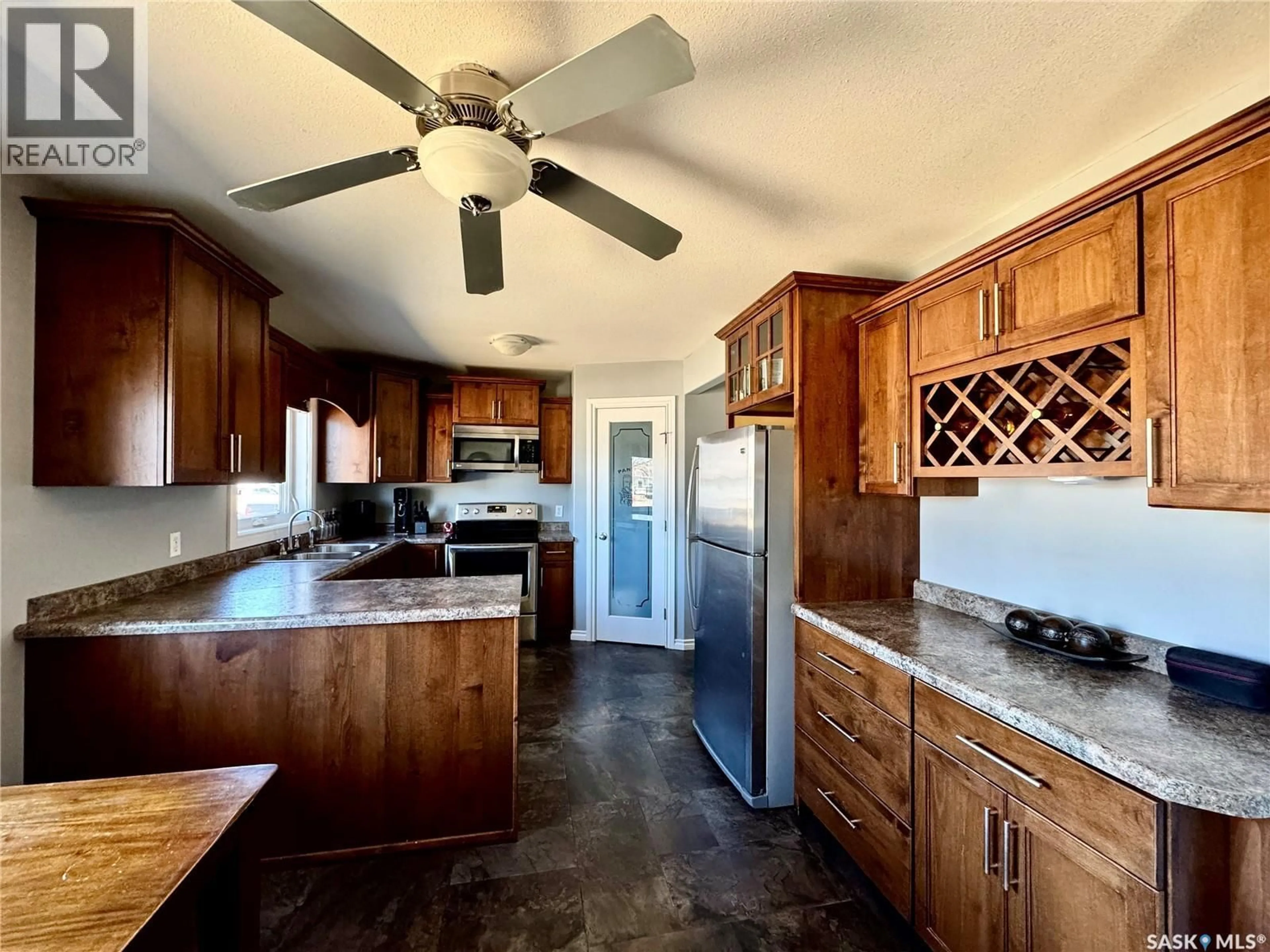 Open concept kitchen, ceramic/tile floor for 320 3RD STREET, Bredenbury Saskatchewan S0A0H0