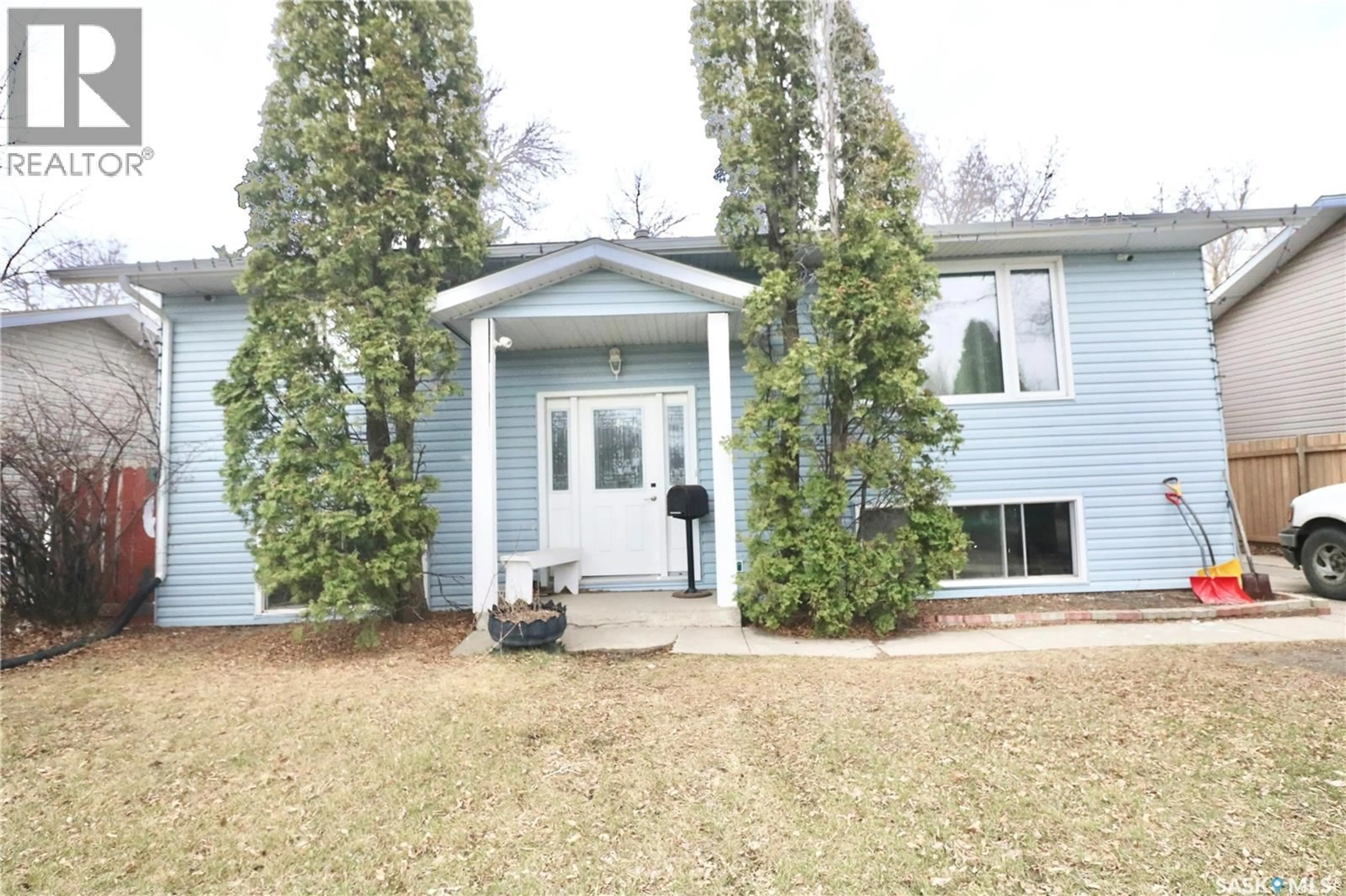 Home with vinyl exterior material, street for 6507 1ST AVENUE, Regina Saskatchewan S4T7C2