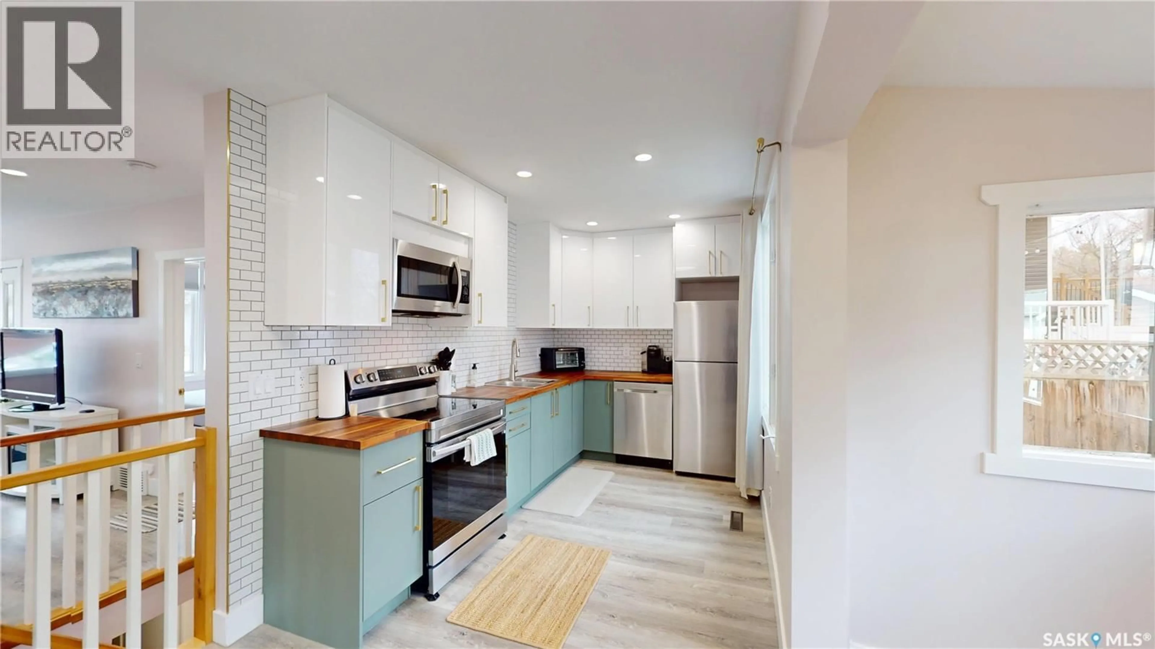 Open concept kitchen, ceramic/tile floor for 1232 2ND AVENUE, Saskatoon Saskatchewan S7K2E4