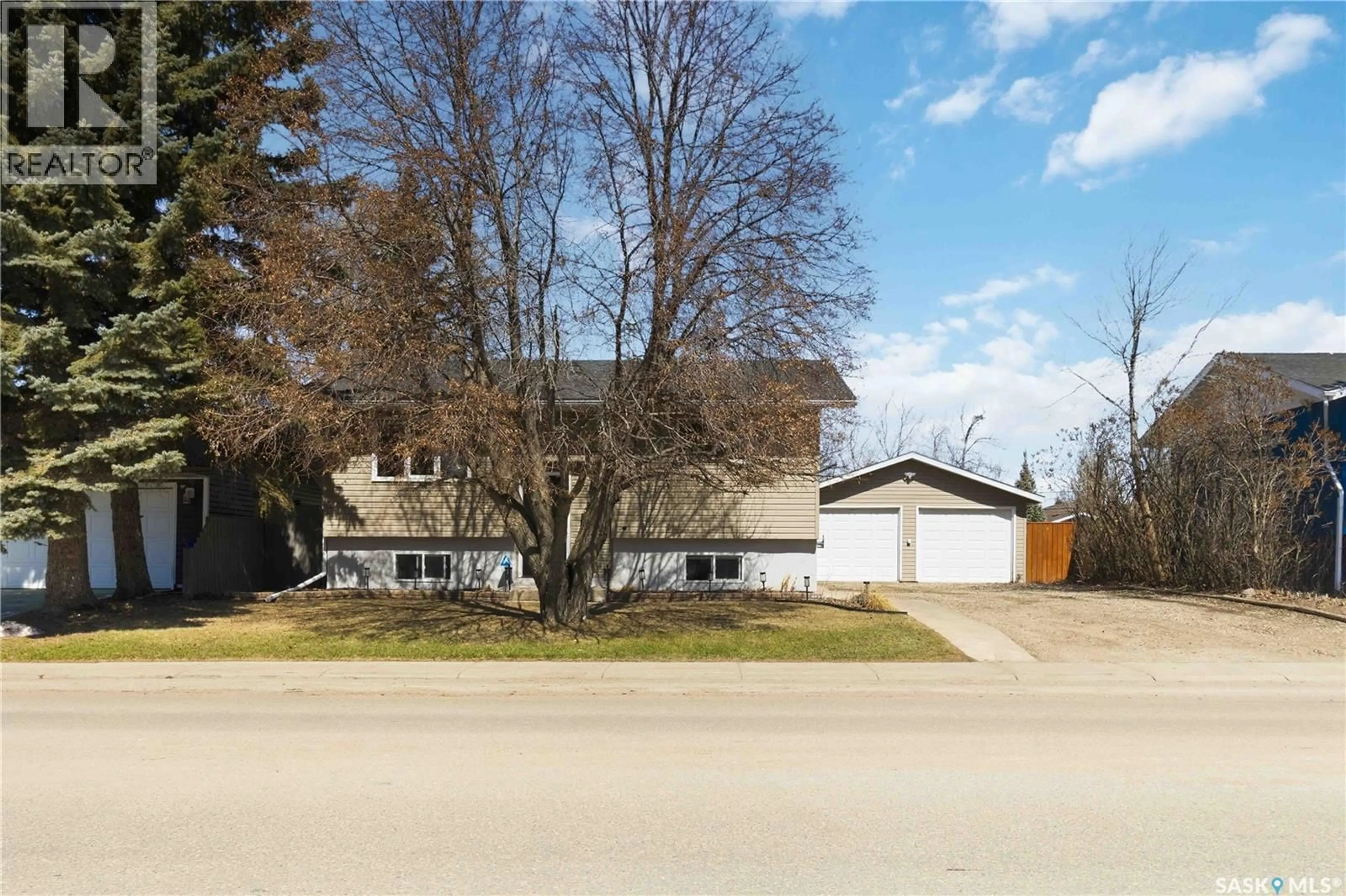 A pic from outside/outdoor area/front of a property/back of a property/a pic from drone, street for 401 3RD STREET, Martensville Saskatchewan S0K2T2