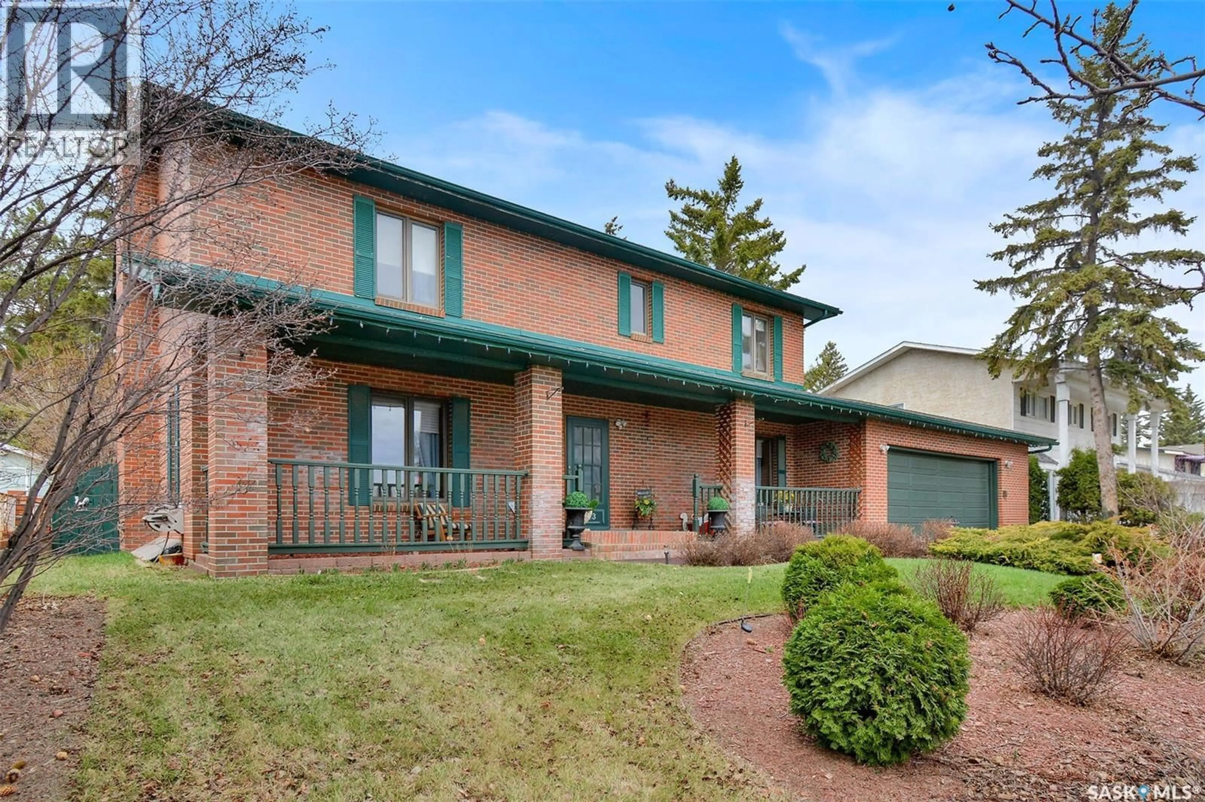Home with brick exterior material, street for 223 WHITESWAN DRIVE, Saskatoon Saskatchewan S7K4M6
