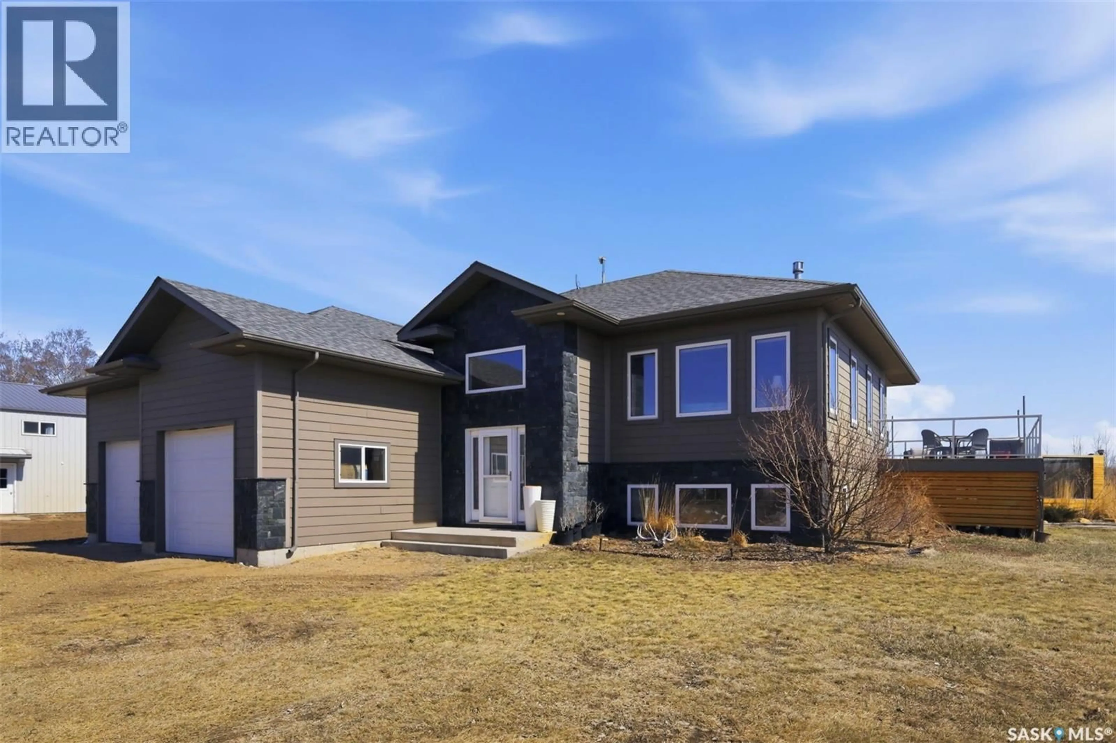 Home with vinyl exterior material, street for T&T ACRES, Corman Park Rm No. 344 Saskatchewan S7K3J5