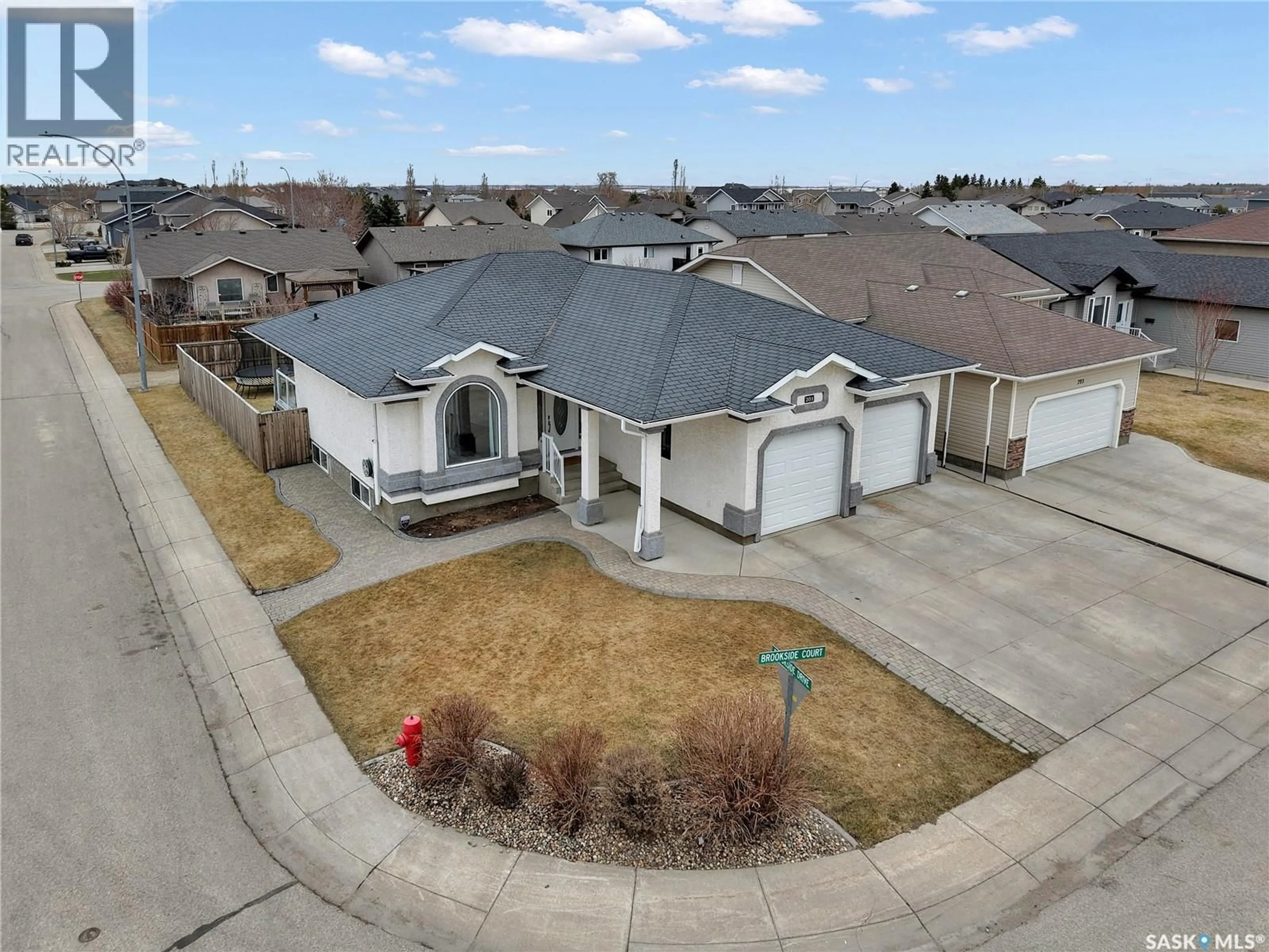A pic from outside/outdoor area/front of a property/back of a property/a pic from drone, street for 201 BROOKSIDE COURT, Warman Saskatchewan S0K0A1