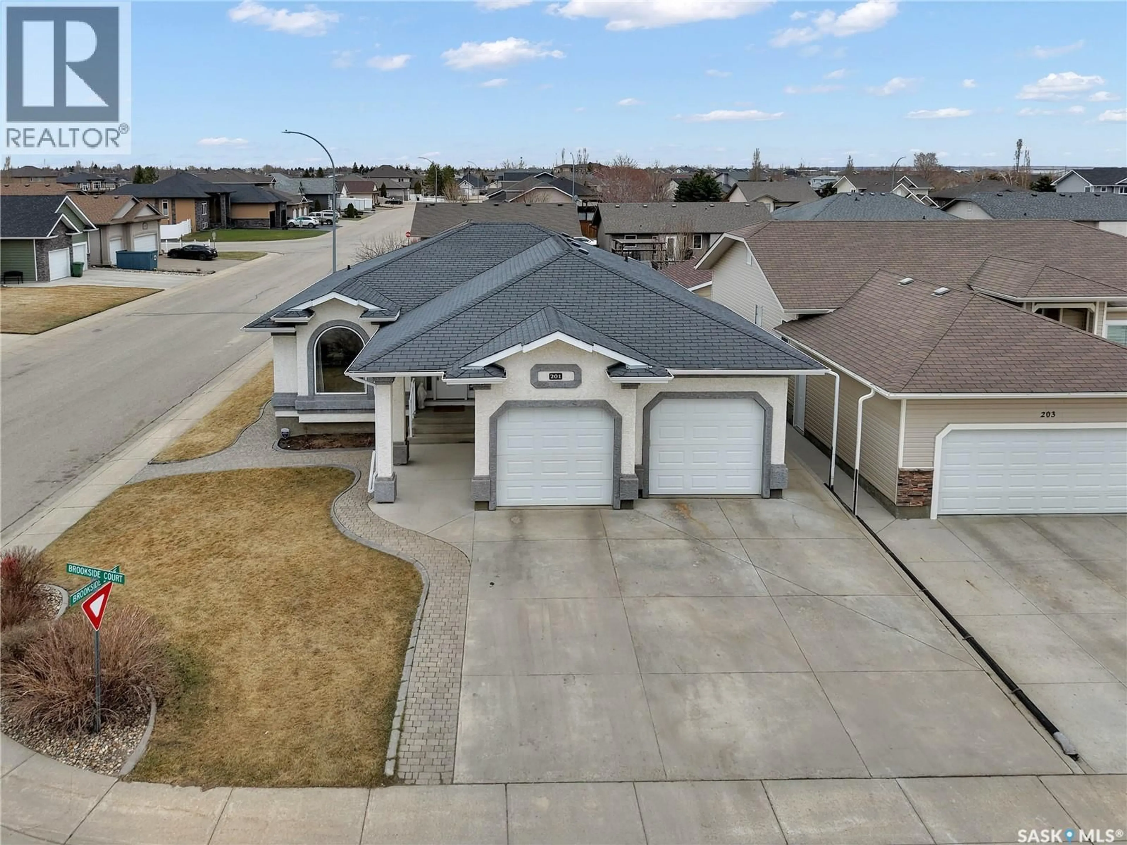 A pic from outside/outdoor area/front of a property/back of a property/a pic from drone, street for 201 BROOKSIDE COURT, Warman Saskatchewan S0K0A1