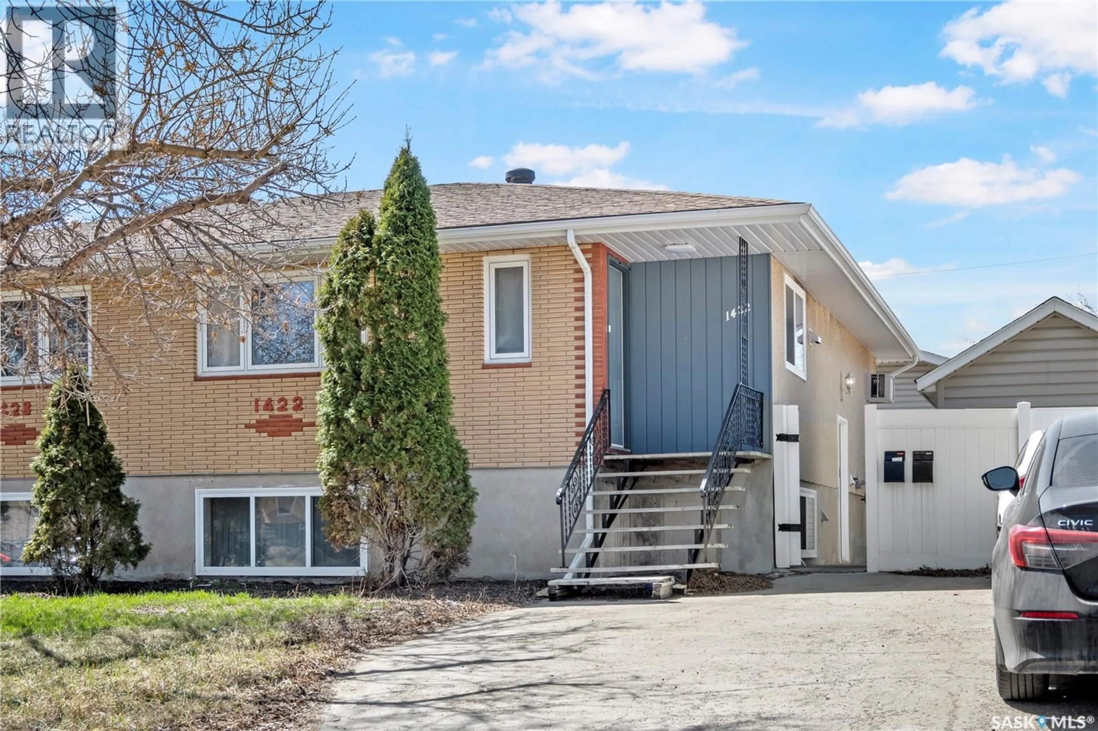 Home with vinyl exterior material, street for 1422 RUPERT STREET, Regina Saskatchewan S4N1V8