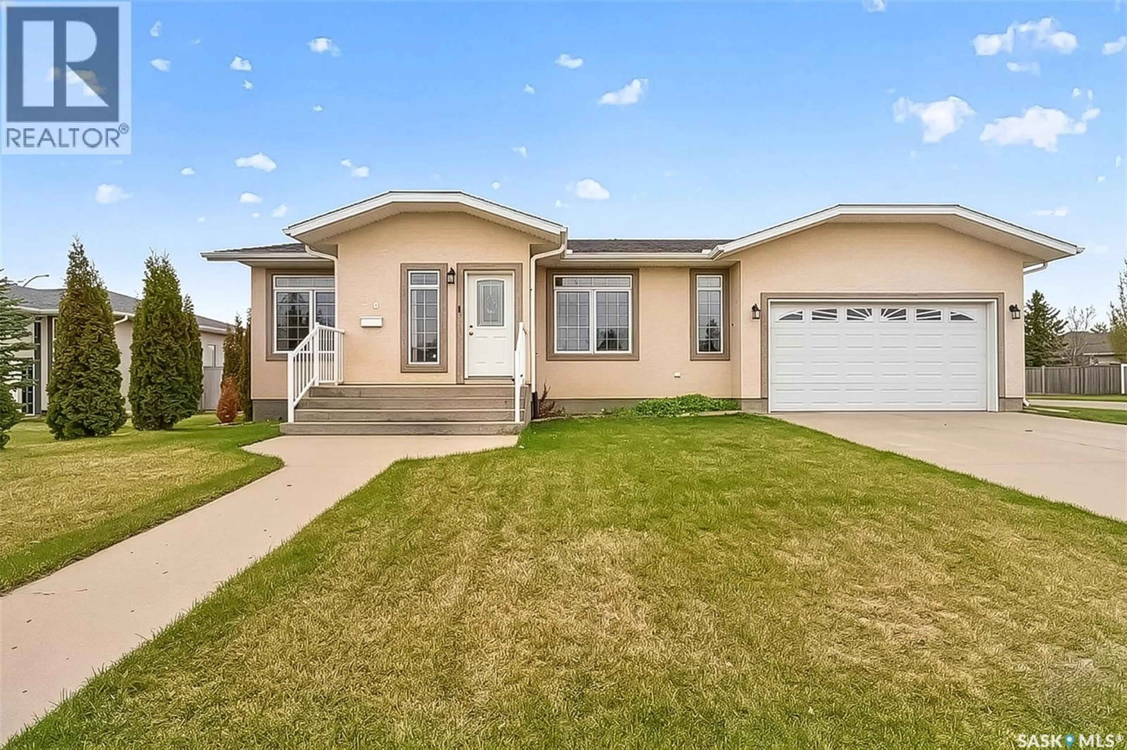 Home with vinyl exterior material, street for 16 FLAX ROAD, Moose Jaw Saskatchewan S6J1G3