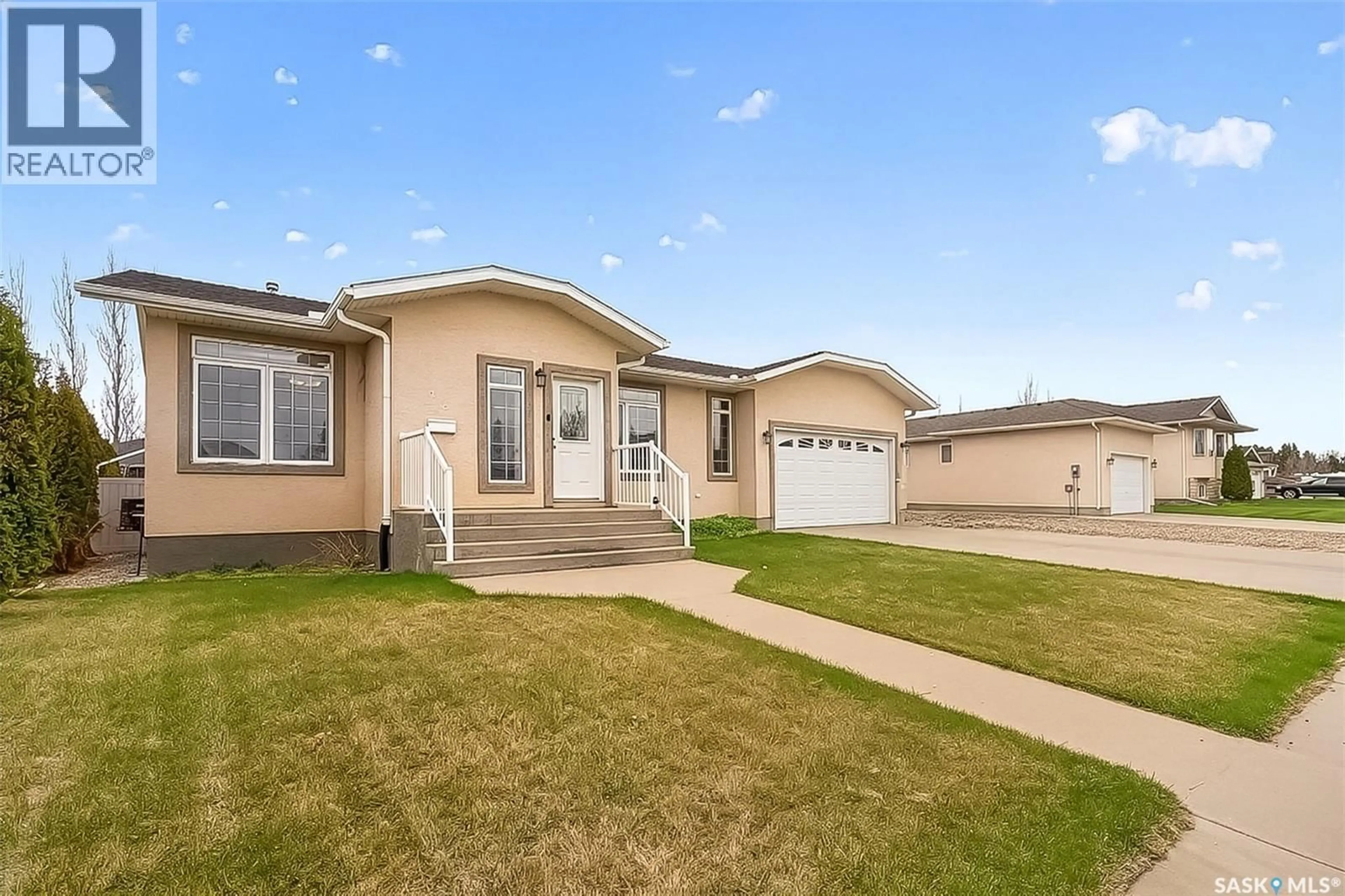 Home with vinyl exterior material, street for 16 FLAX ROAD, Moose Jaw Saskatchewan S6J1G3