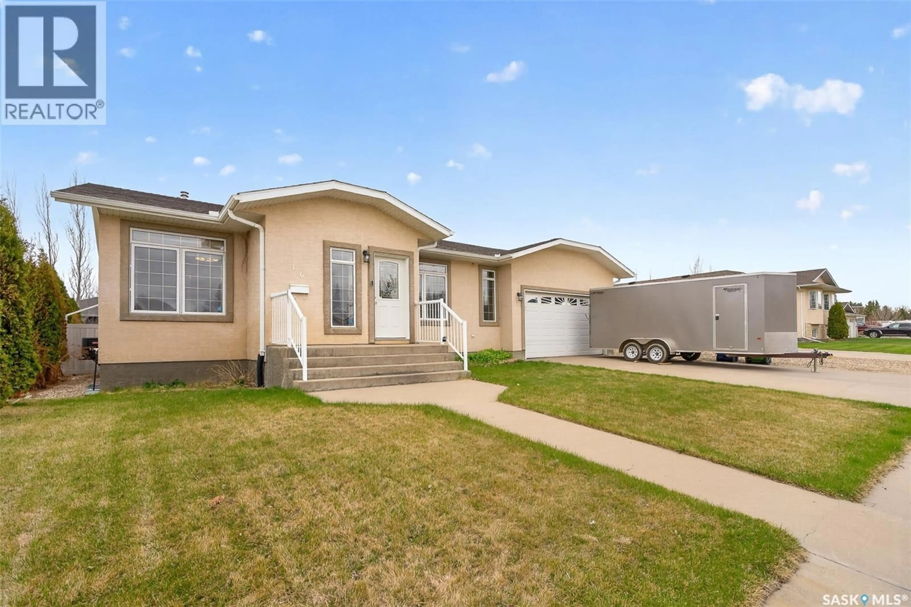 Home with vinyl exterior material, street for 16 FLAX ROAD, Moose Jaw Saskatchewan S6J1G3