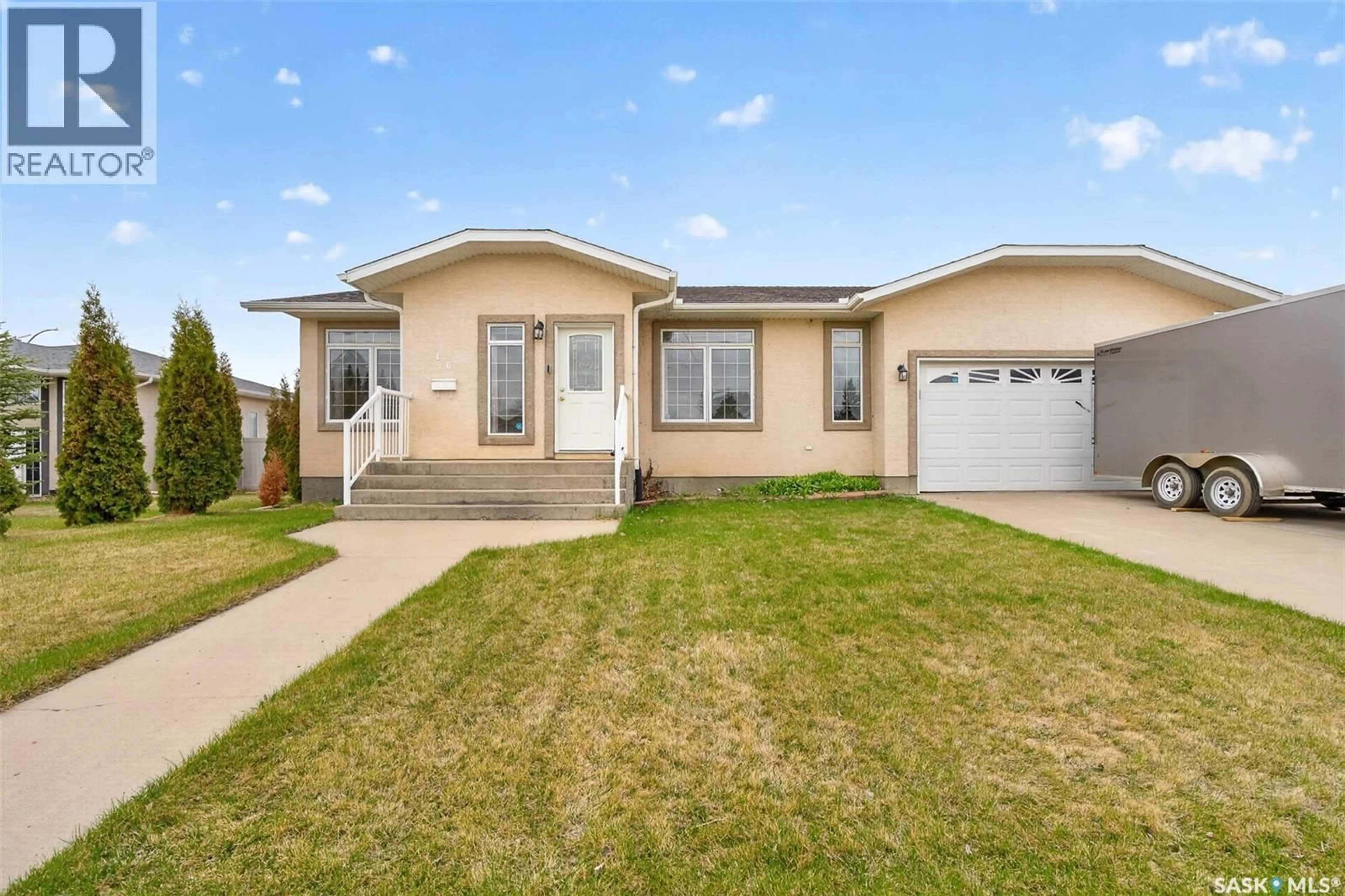 Home with vinyl exterior material, street for 16 FLAX ROAD, Moose Jaw Saskatchewan S6J1G3