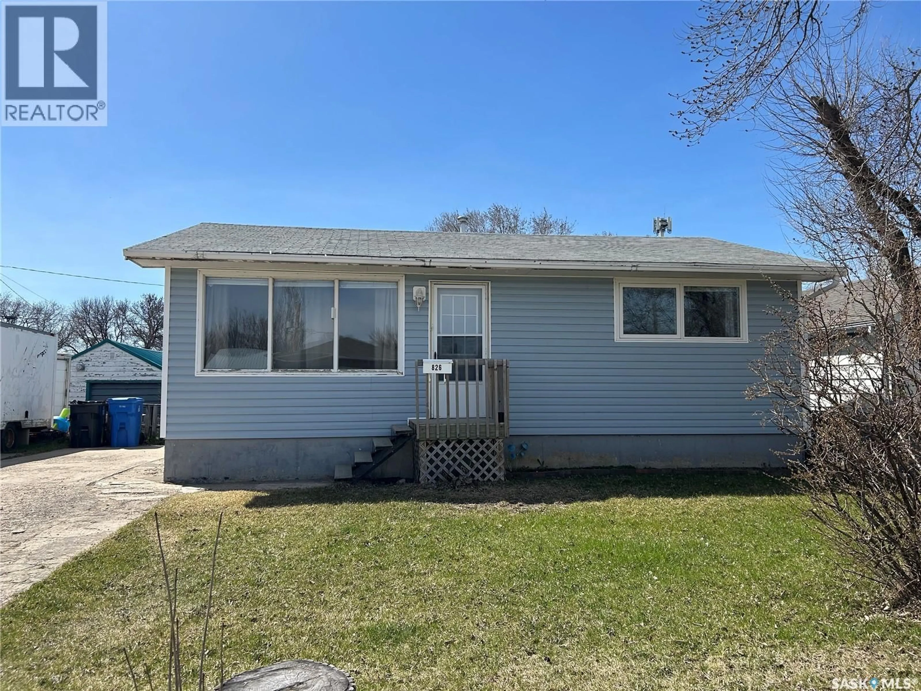 Home with vinyl exterior material, street for 826 EVA STREET, Estevan Saskatchewan S4A1P3