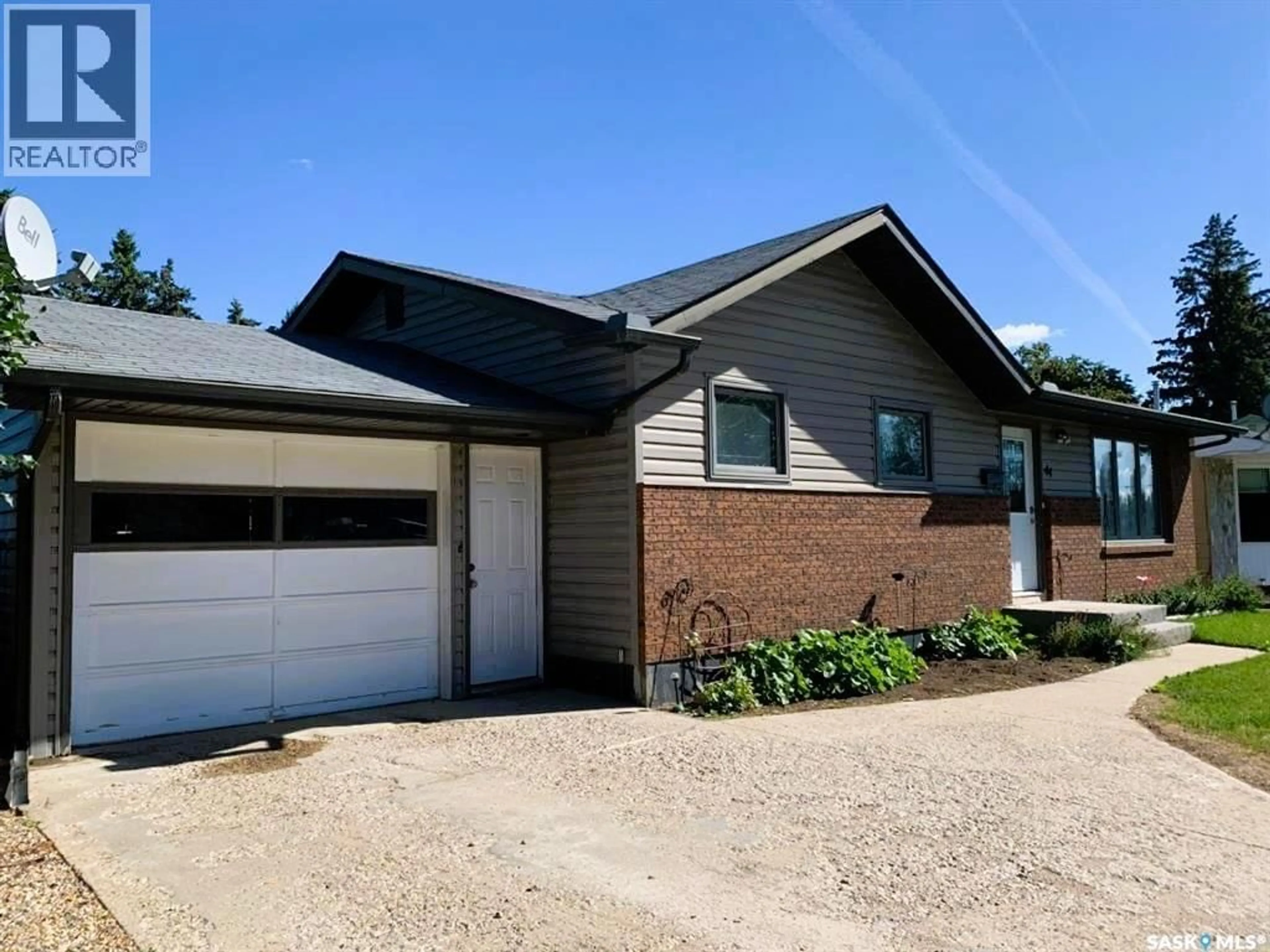Home with brick exterior material, street for 44 CAMPBELL PLACE, Clavet Saskatchewan S0K0Y0