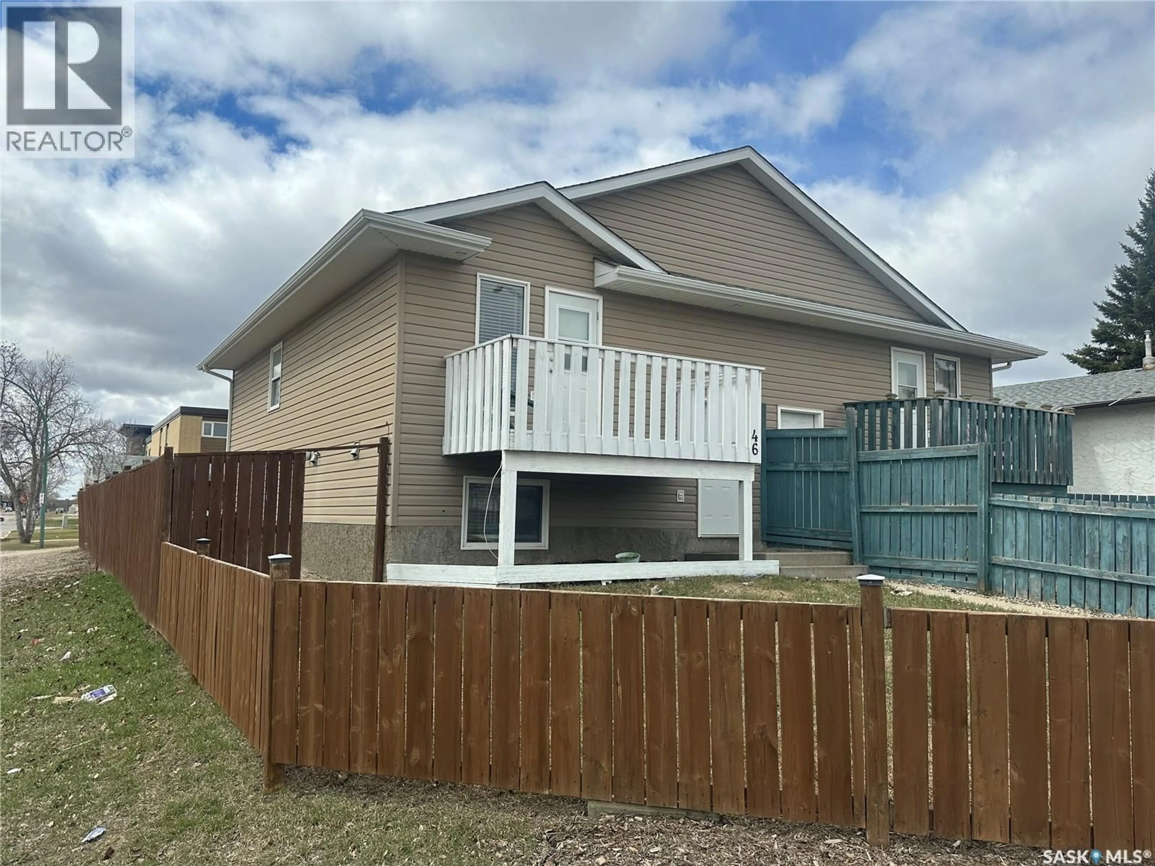 Home with vinyl exterior material, street for 46 CLARKE AVENUE, Yorkton Saskatchewan S3N2M3