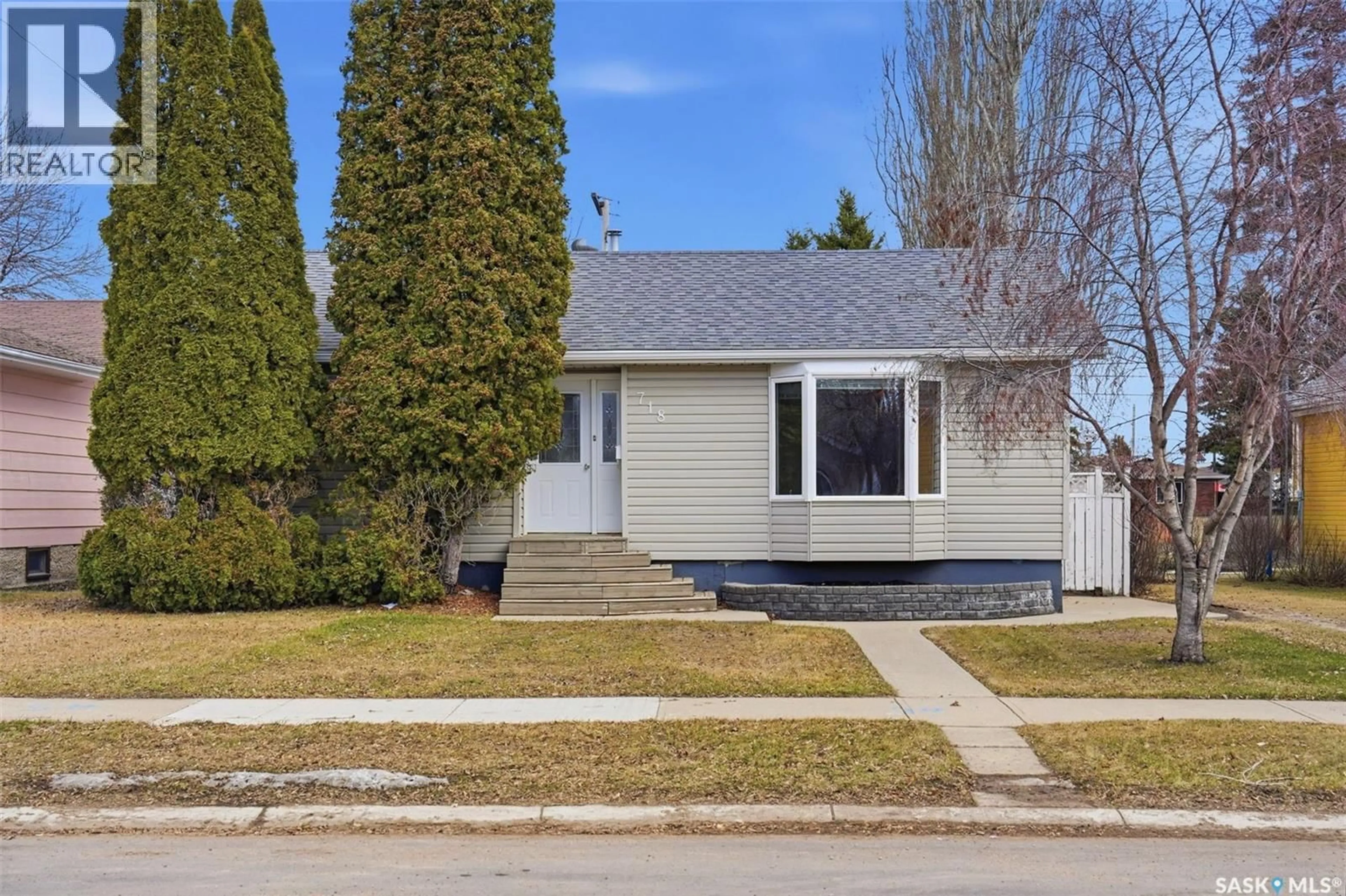 Home with vinyl exterior material, street for 718 11TH STREET, Humboldt Saskatchewan S0K2A0