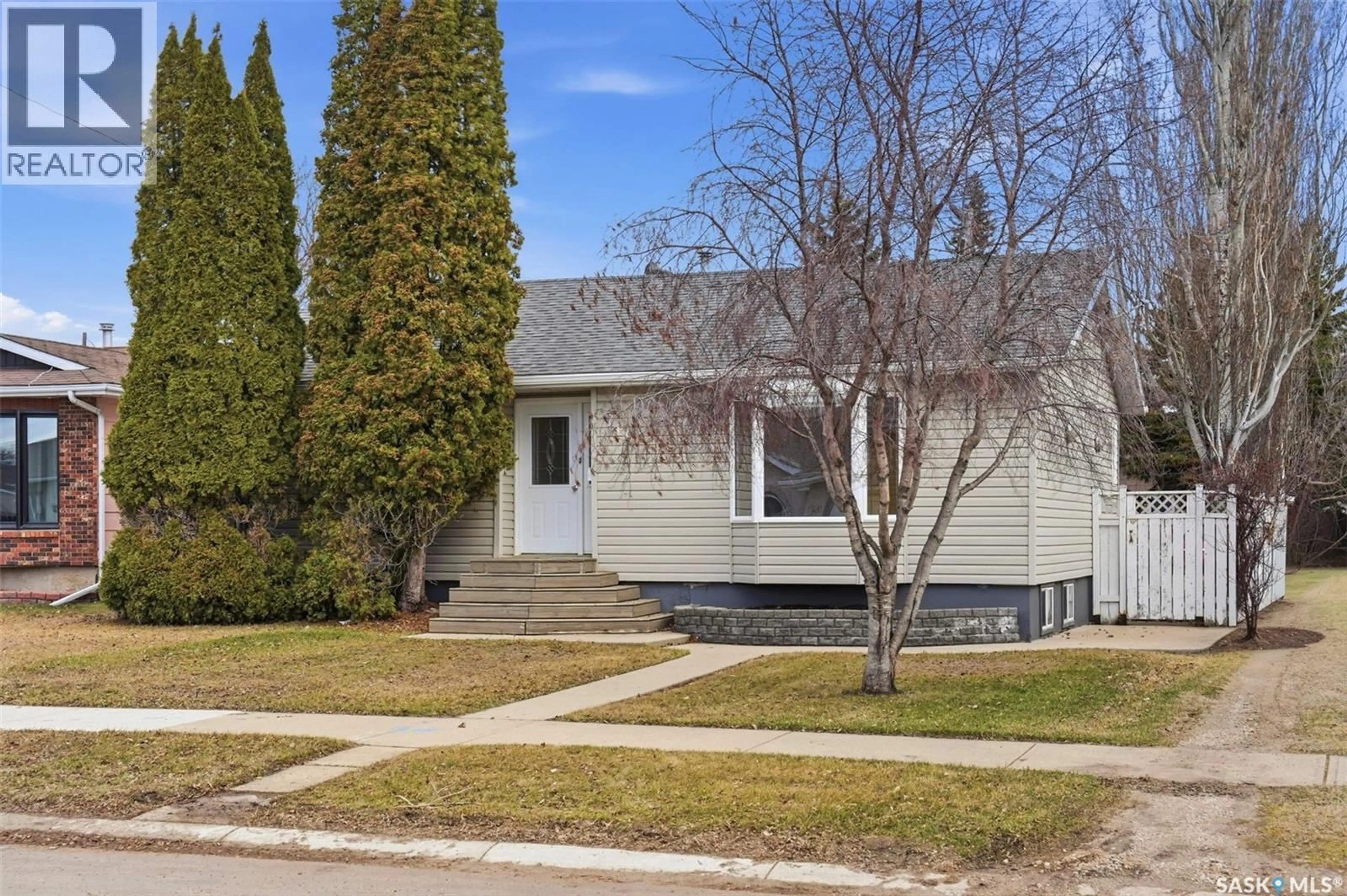 Home with vinyl exterior material, street for 718 11TH STREET, Humboldt Saskatchewan S0K2A0