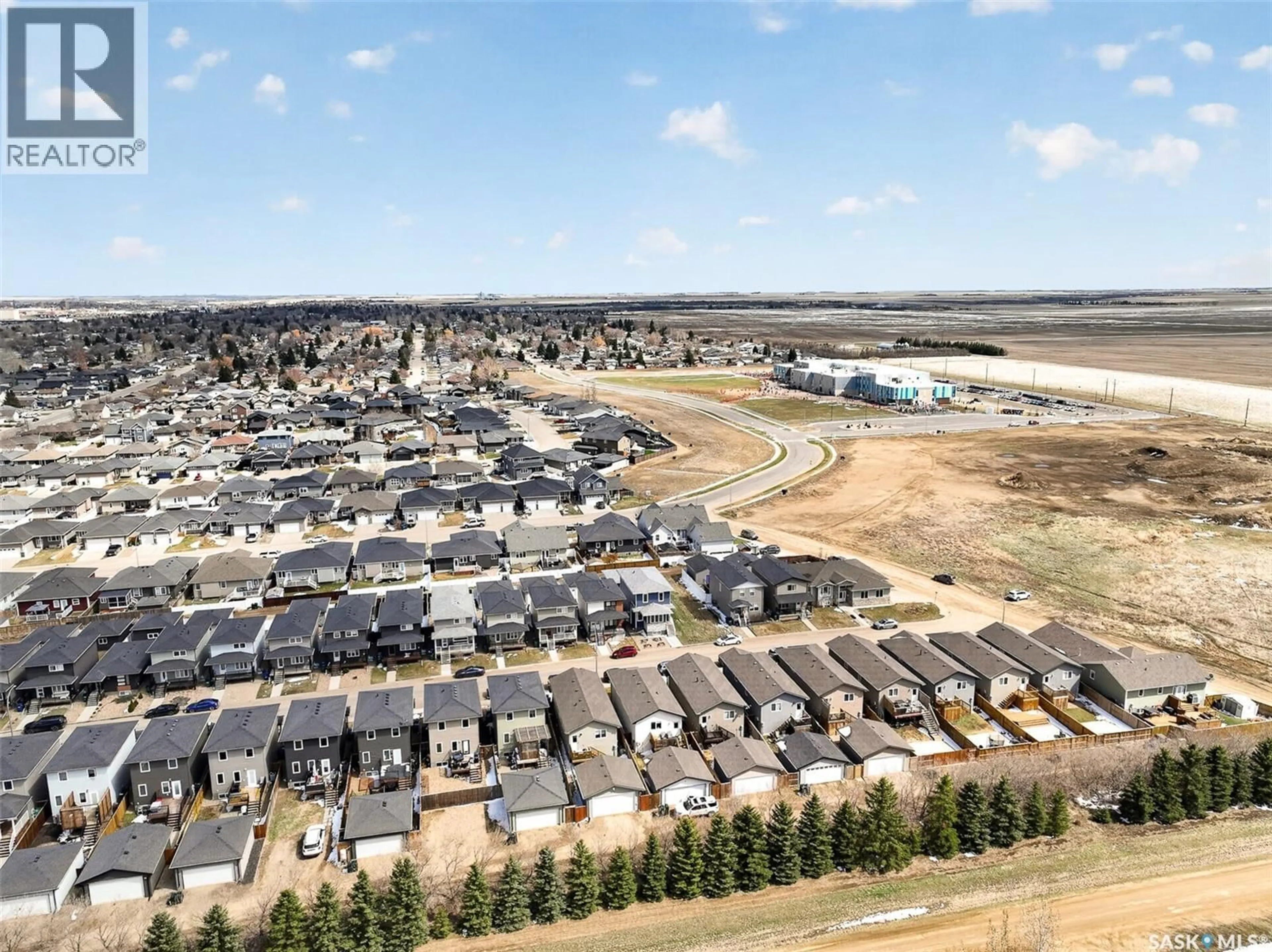 A pic from outside/outdoor area/front of a property/back of a property/a pic from drone, street for 81 BRIGHAM ROAD, Moose Jaw Saskatchewan S6K0A7