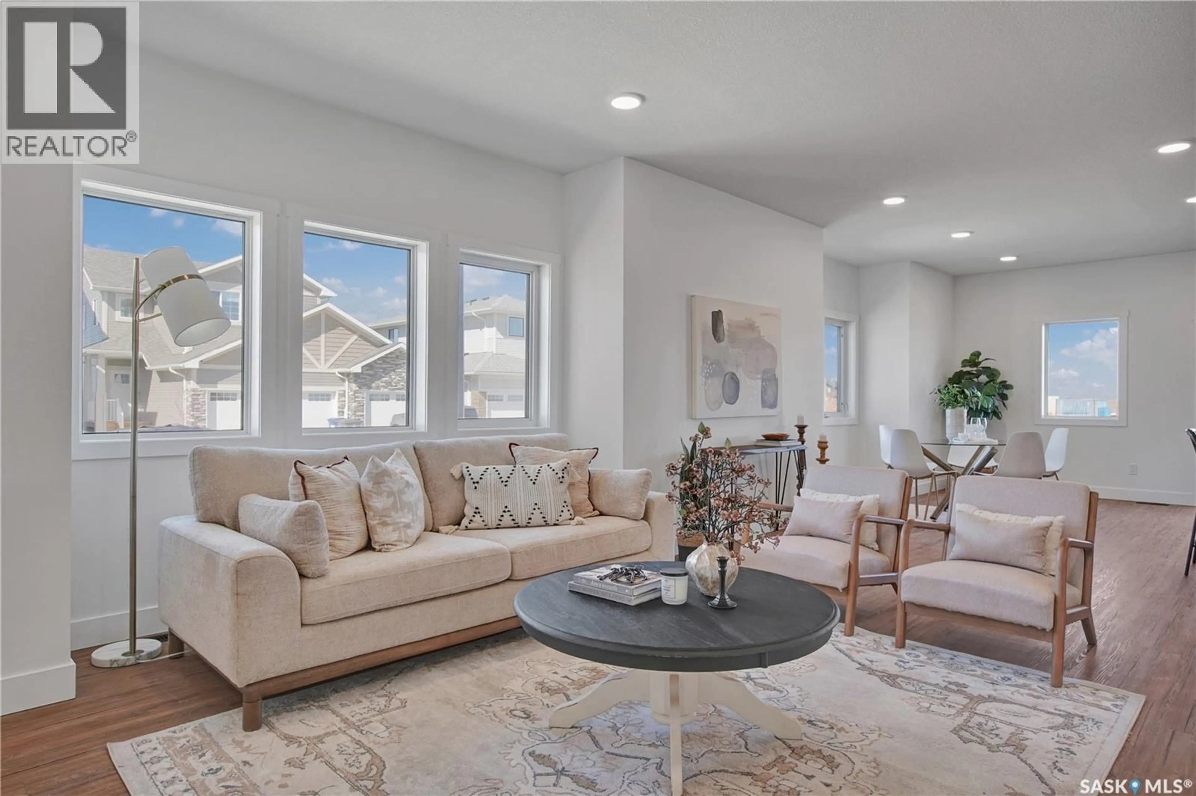 Living room with furniture, ceramic/tile floor for 101 EMMA CRESCENT, Martensville Saskatchewan S0K2T1