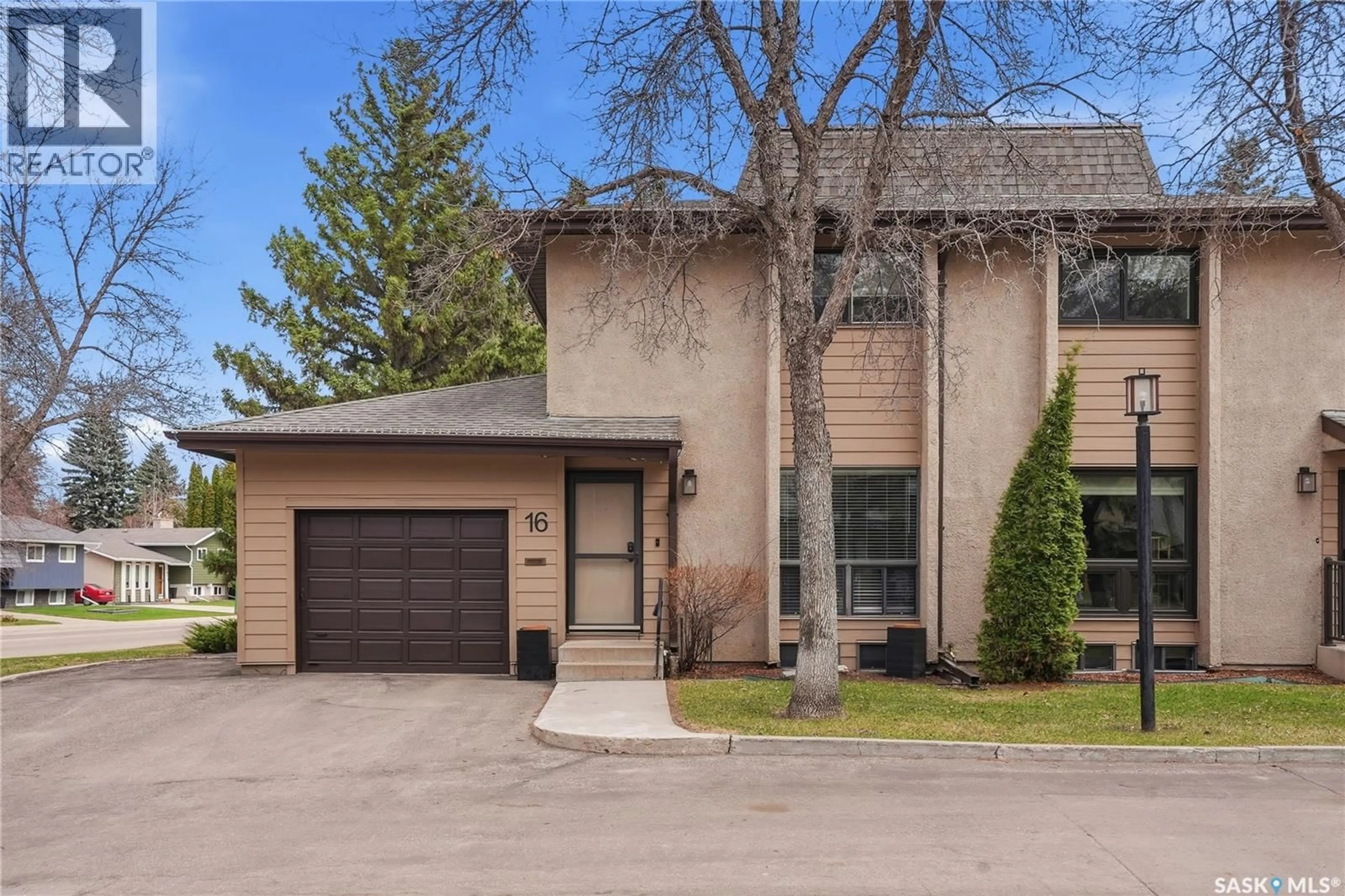 Home with brick exterior material, street for 16 425 PINEHOUSE DRIVE, Saskatoon Saskatchewan S7K5K2