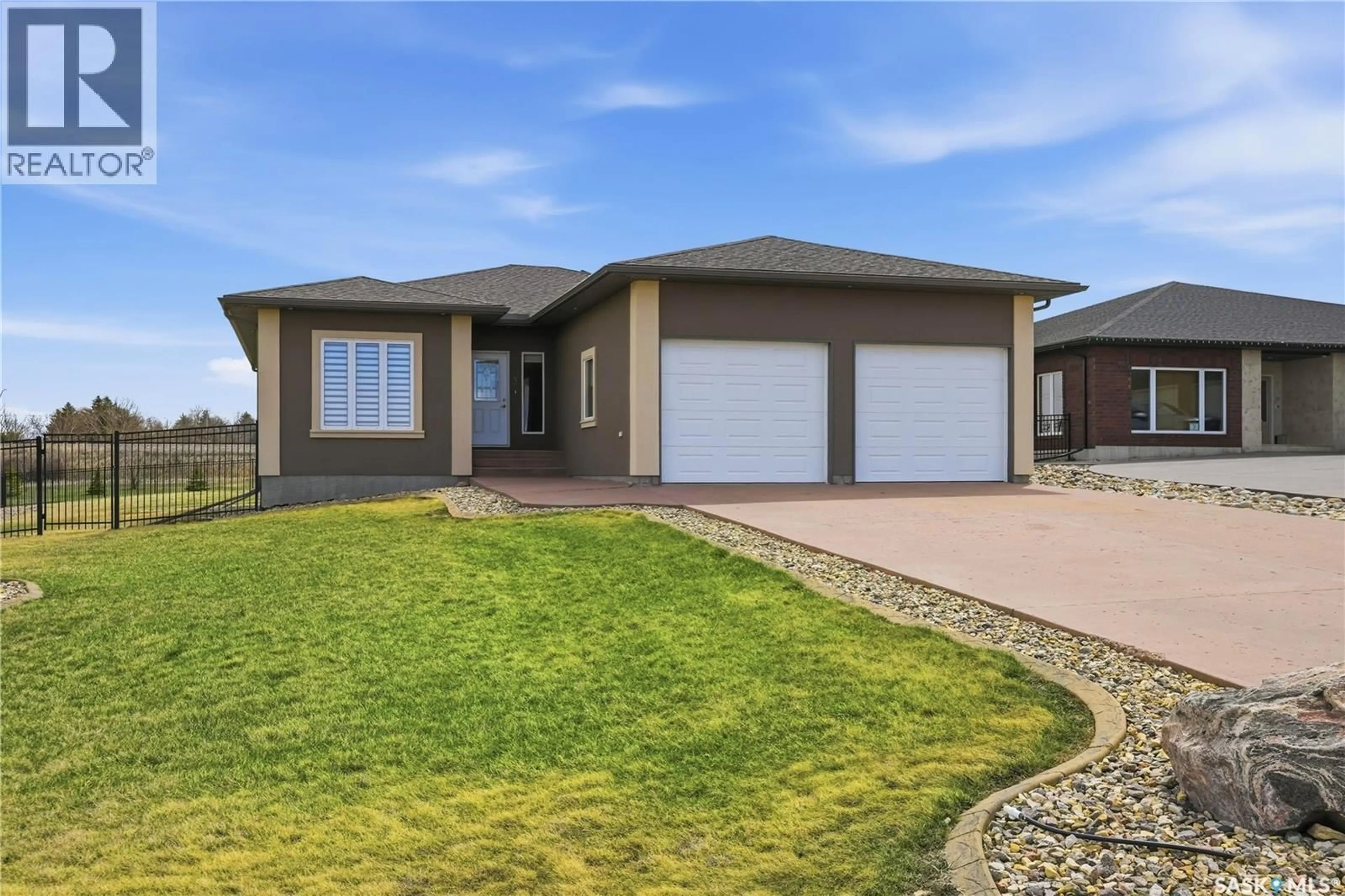 Home with brick exterior material, street for 3 IRON BRIDGE TERRACE, Moose Jaw Saskatchewan S6J0B5