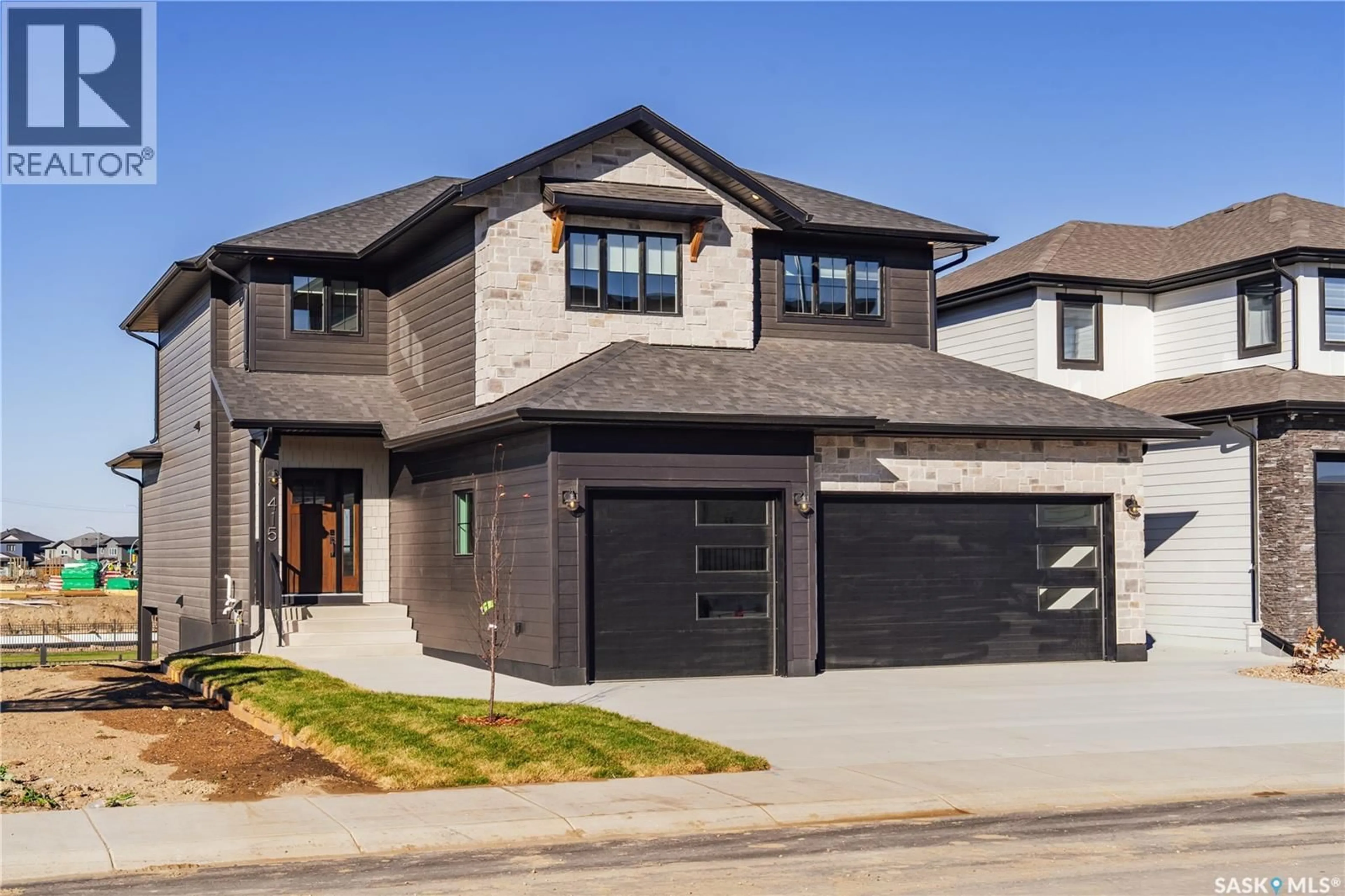 Home with brick exterior material, street for 415 SHARMA CRESCENT, Saskatoon Saskatchewan S7W1K8