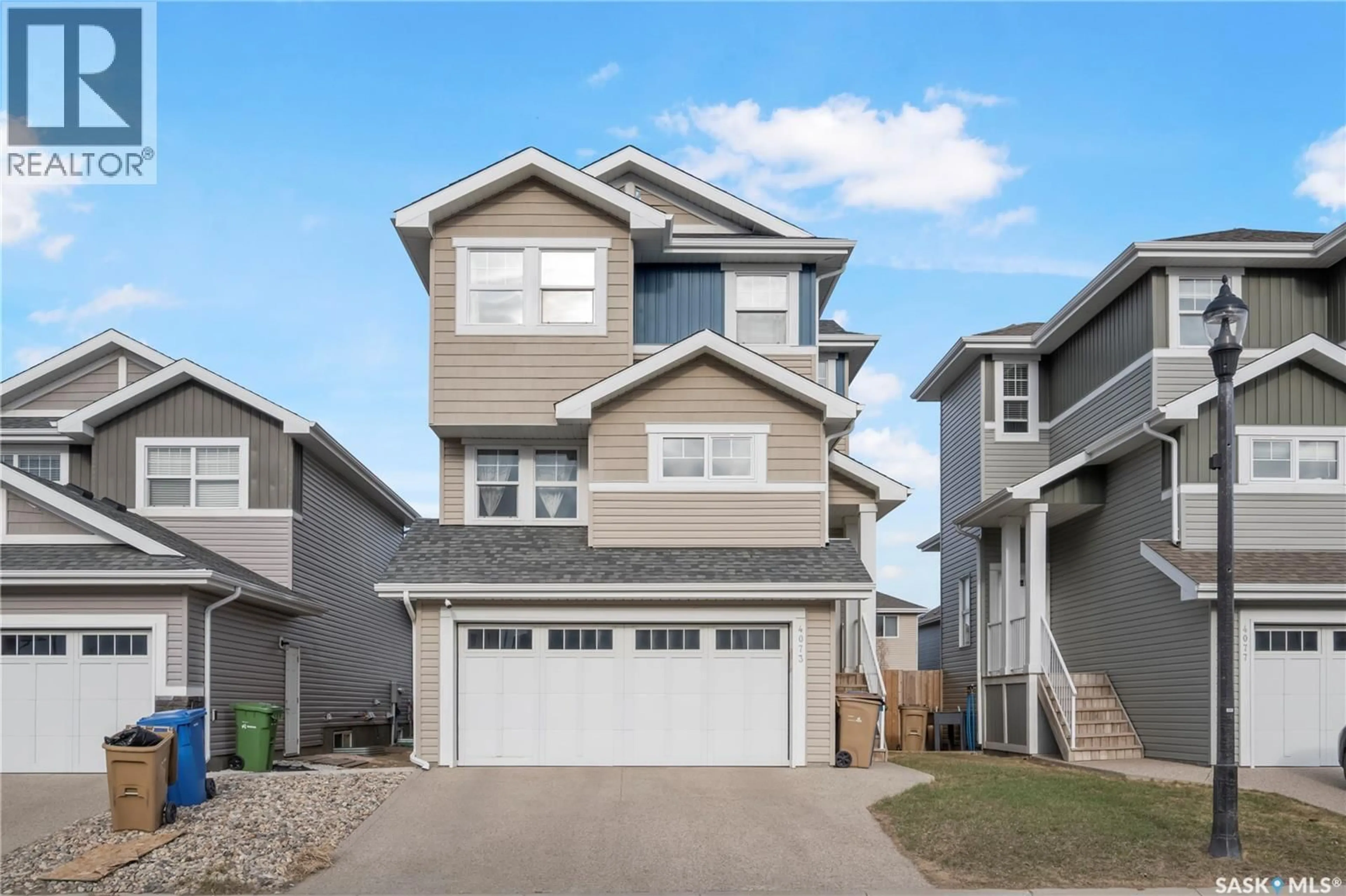 Home with vinyl exterior material, street for 4073 DELHAYE WAY, Regina Saskatchewan S4W0N3