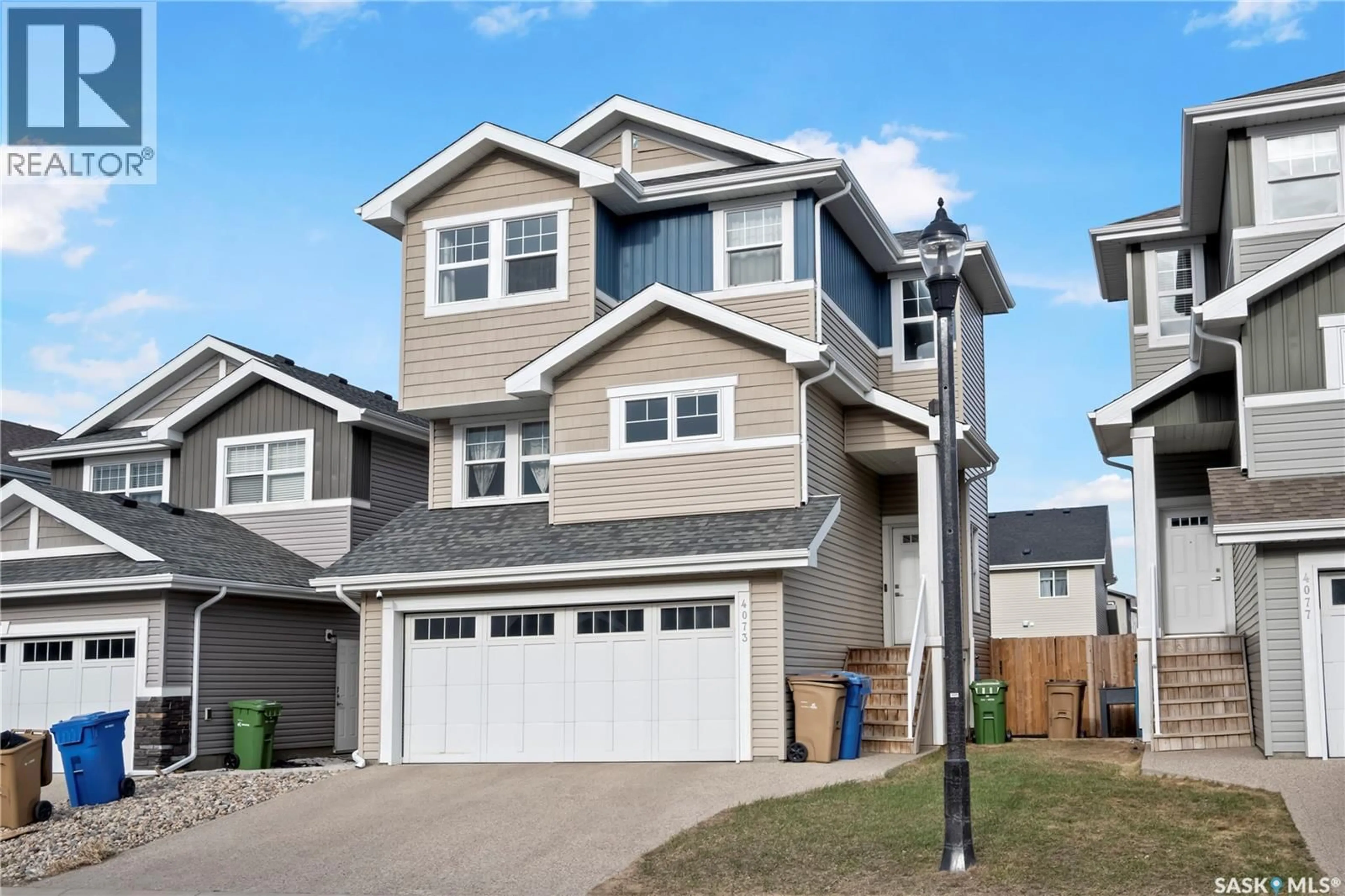 Home with vinyl exterior material, street for 4073 DELHAYE WAY, Regina Saskatchewan S4W0N3