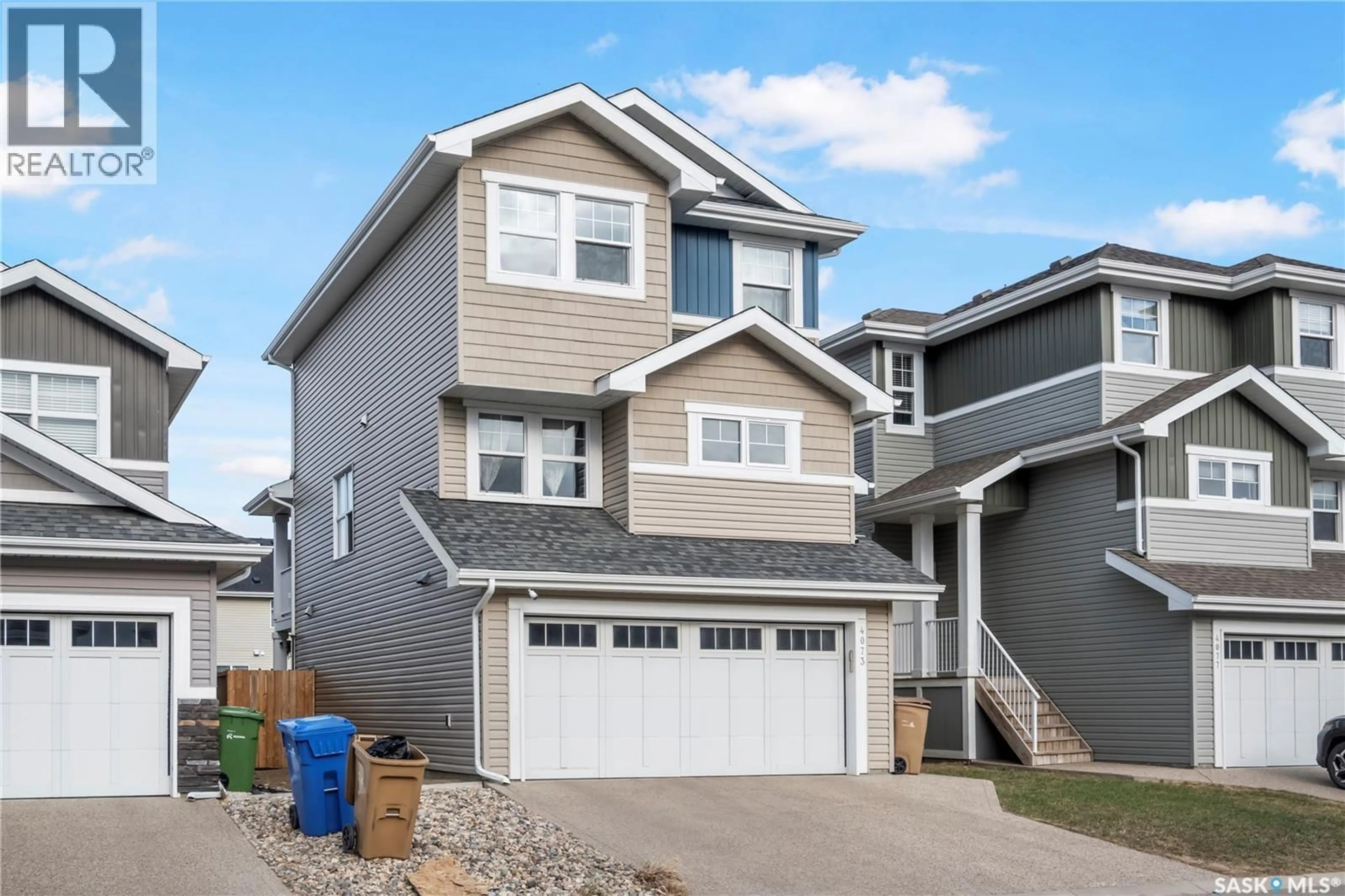 Home with vinyl exterior material, street for 4073 DELHAYE WAY, Regina Saskatchewan S4W0N3
