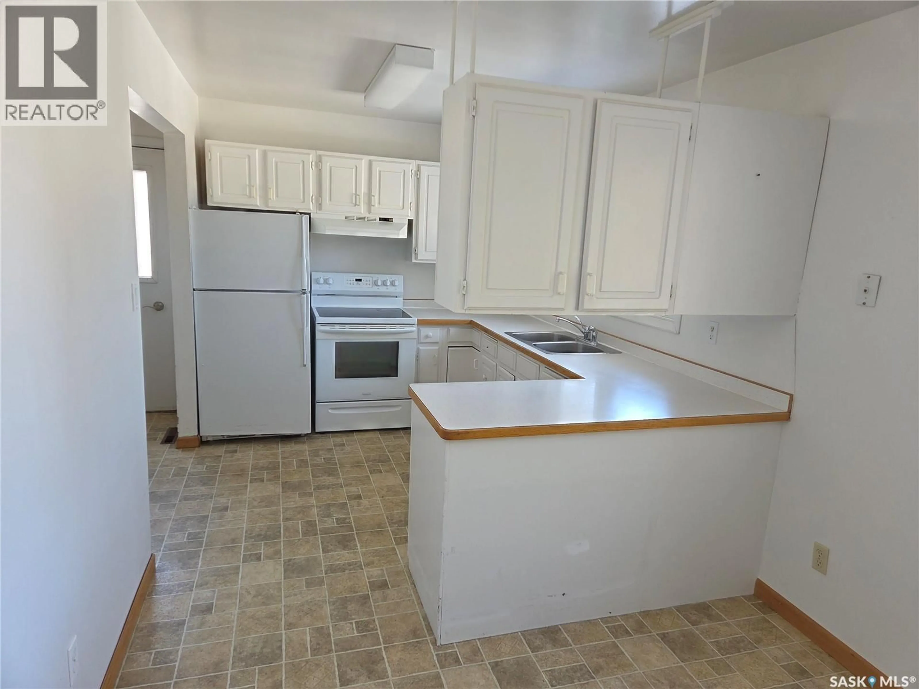 Standard kitchen, unknown for 718 98TH AVENUE, Tisdale Saskatchewan S0E1T0