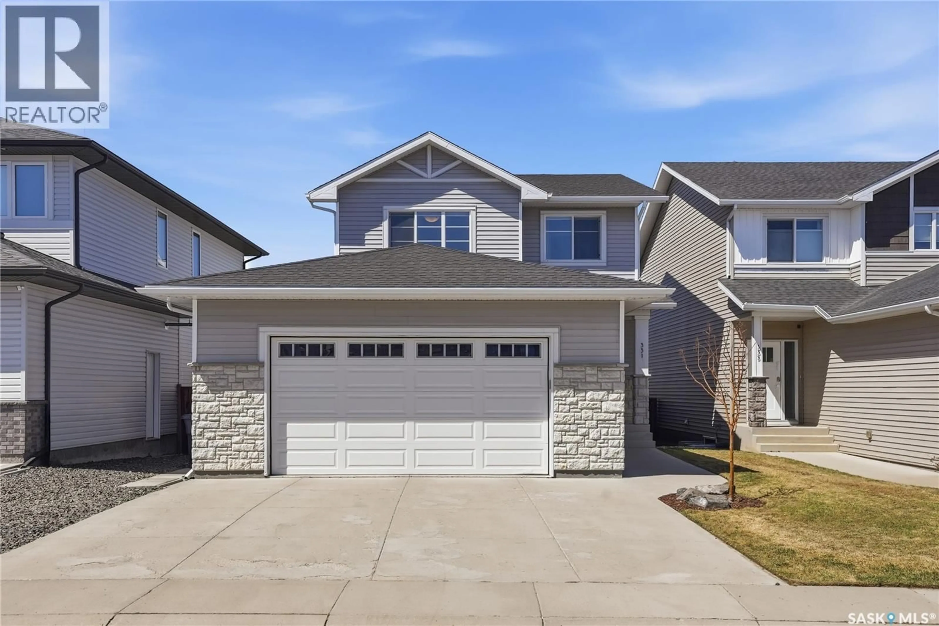 Home with vinyl exterior material, street for 331 UNDERHILL BEND, Saskatoon Saskatchewan S7V0M9