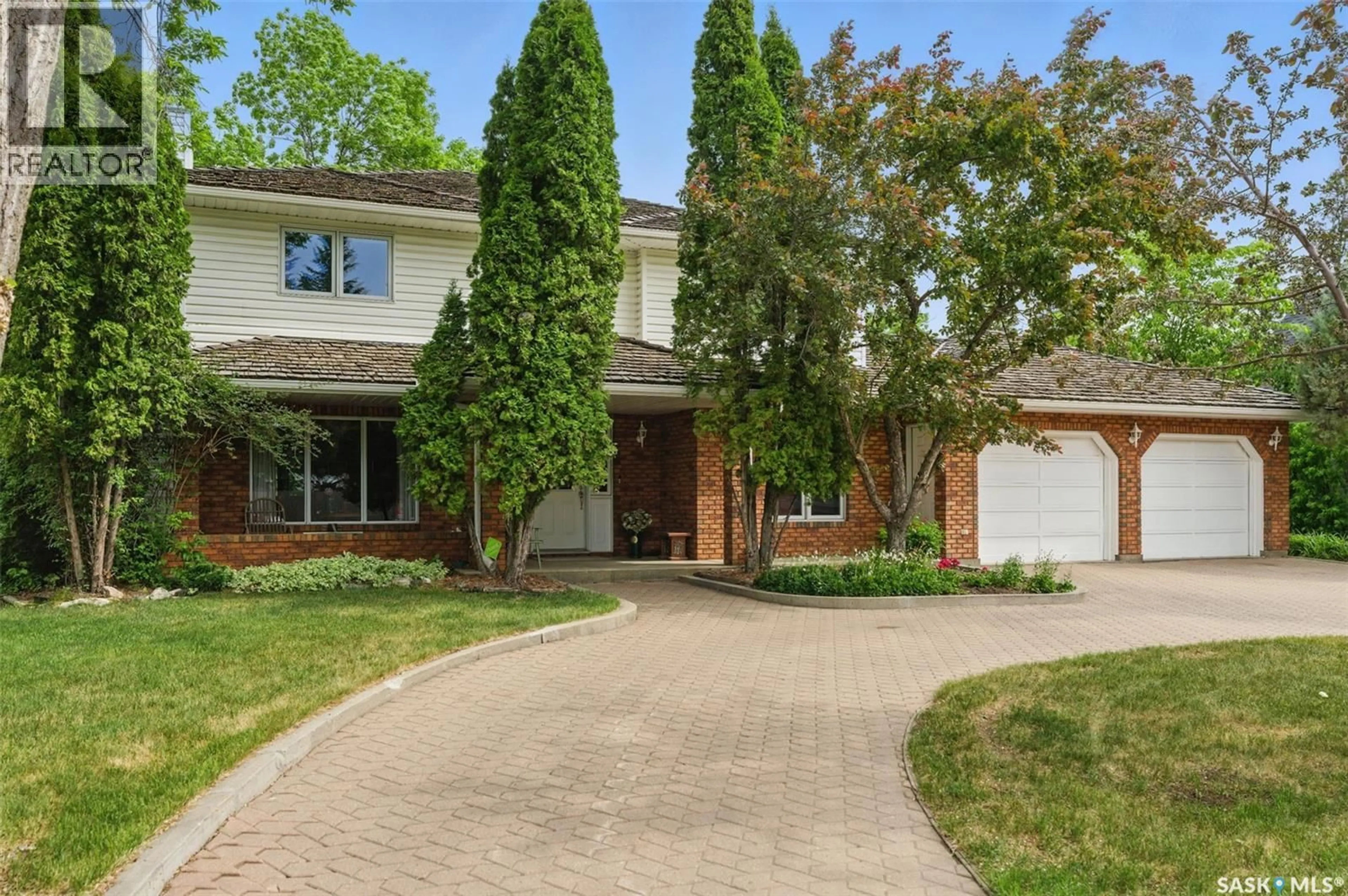 Home with brick exterior material, street for 5052 7TH STREET, Rosthern Saskatchewan S0K3R0
