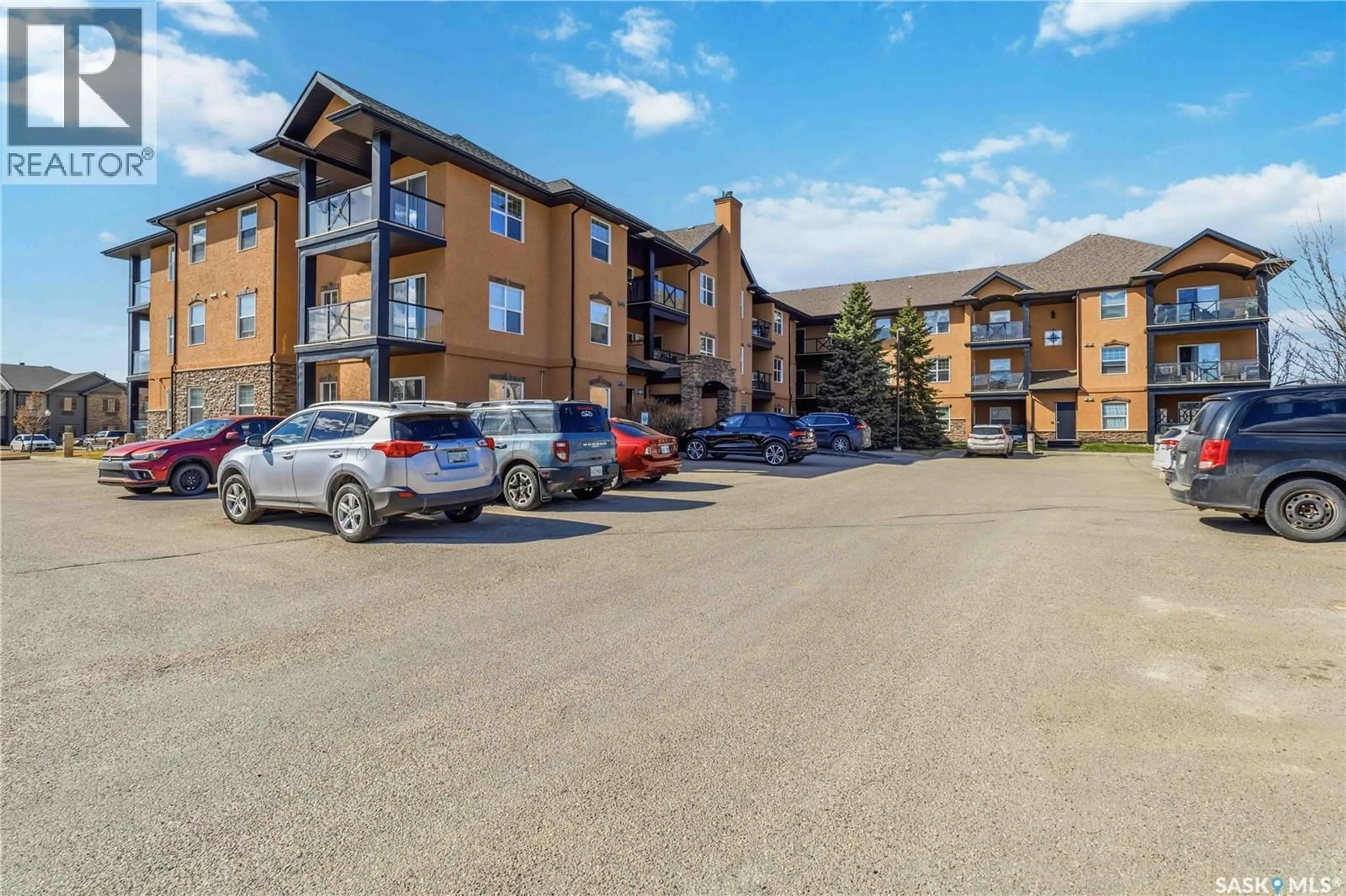 A pic from outside/outdoor area/front of a property/back of a property/a pic from drone, unknown for A210 - 103 WELLMAN CRESCENT, Saskatoon Saskatchewan S7T0C1