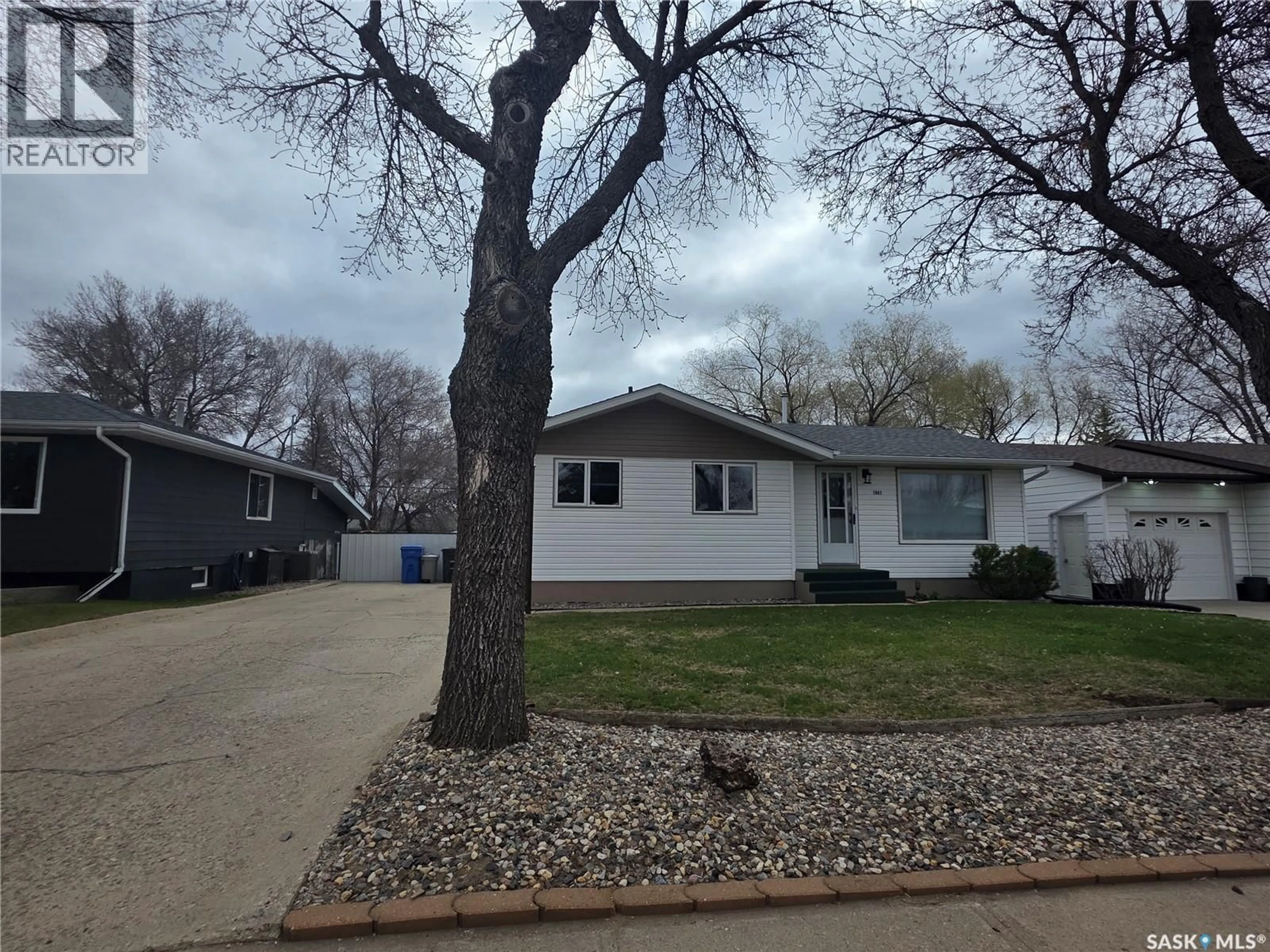 Home with vinyl exterior material, street for 1841 GIBBS ROAD, Estevan Saskatchewan S4A1Y1