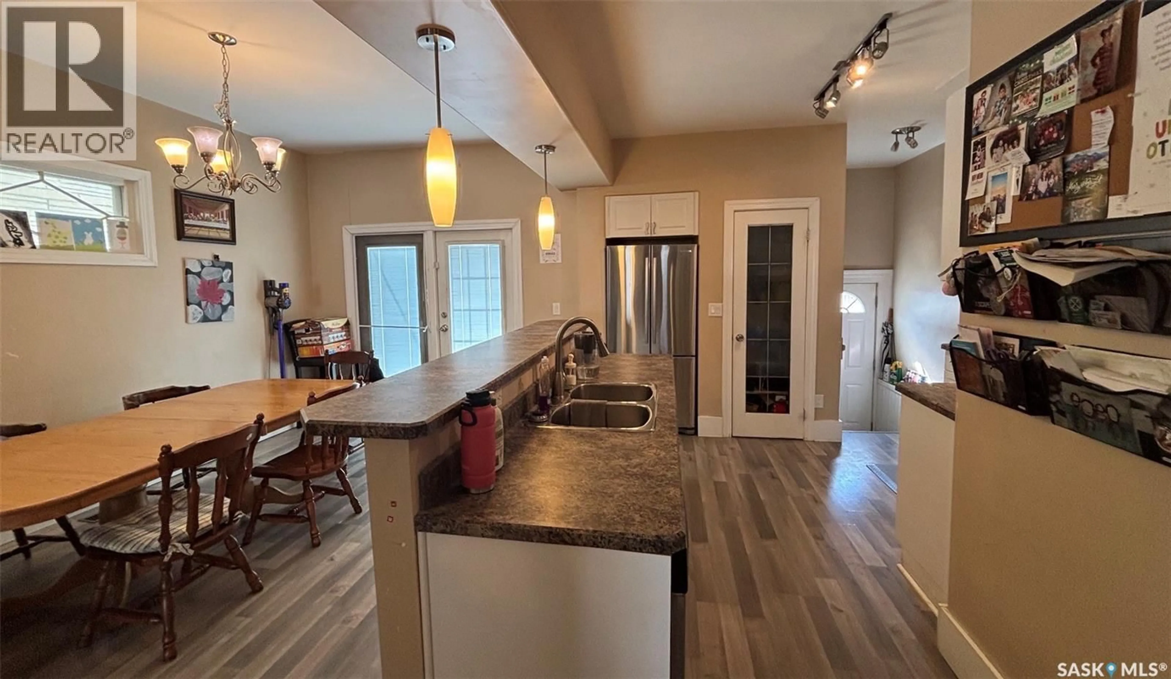 Open concept kitchen, unknown for 2324 HALIFAX STREET, Regina Saskatchewan S4P1V4